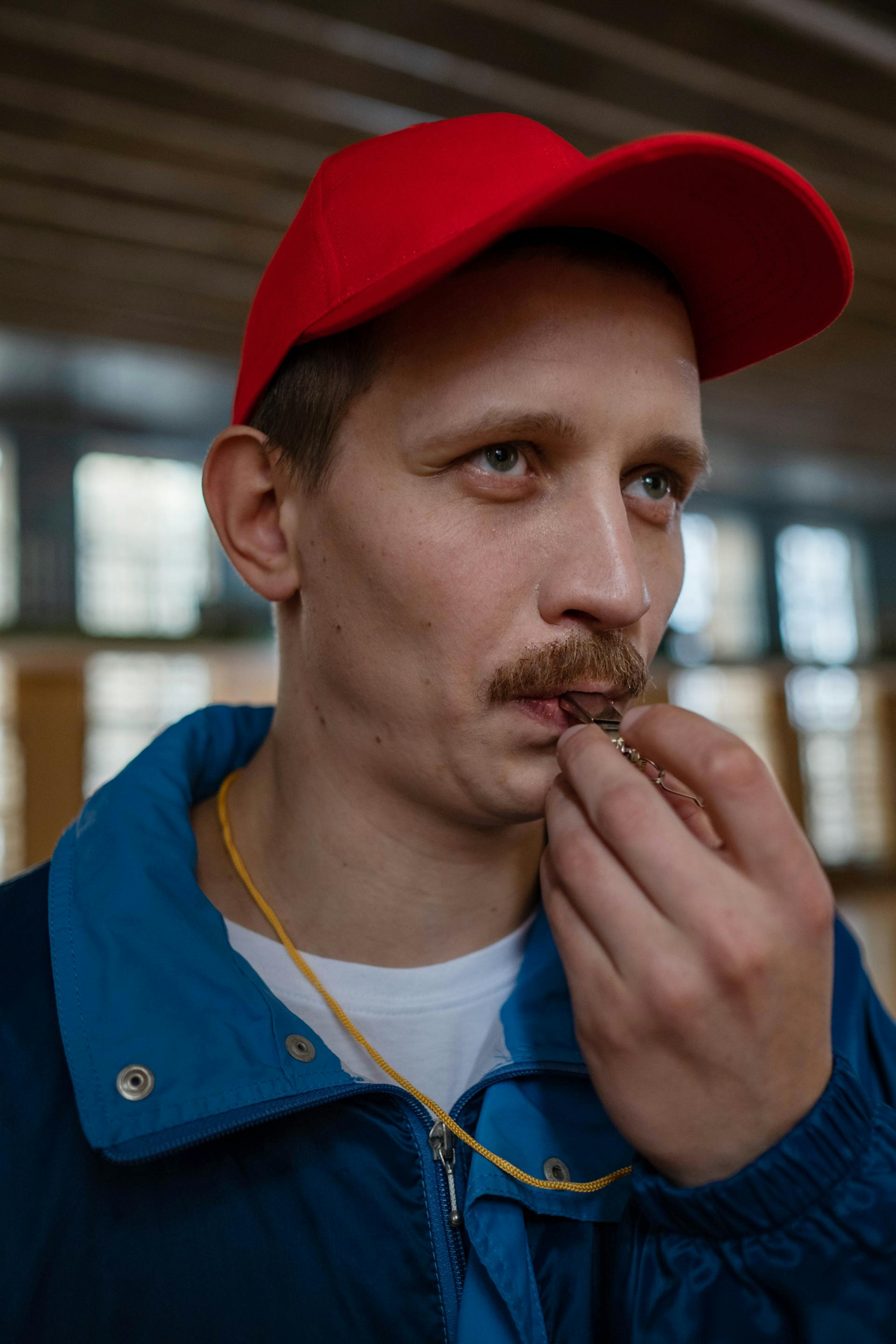 A coach blowing a whistle | Source: Pexels