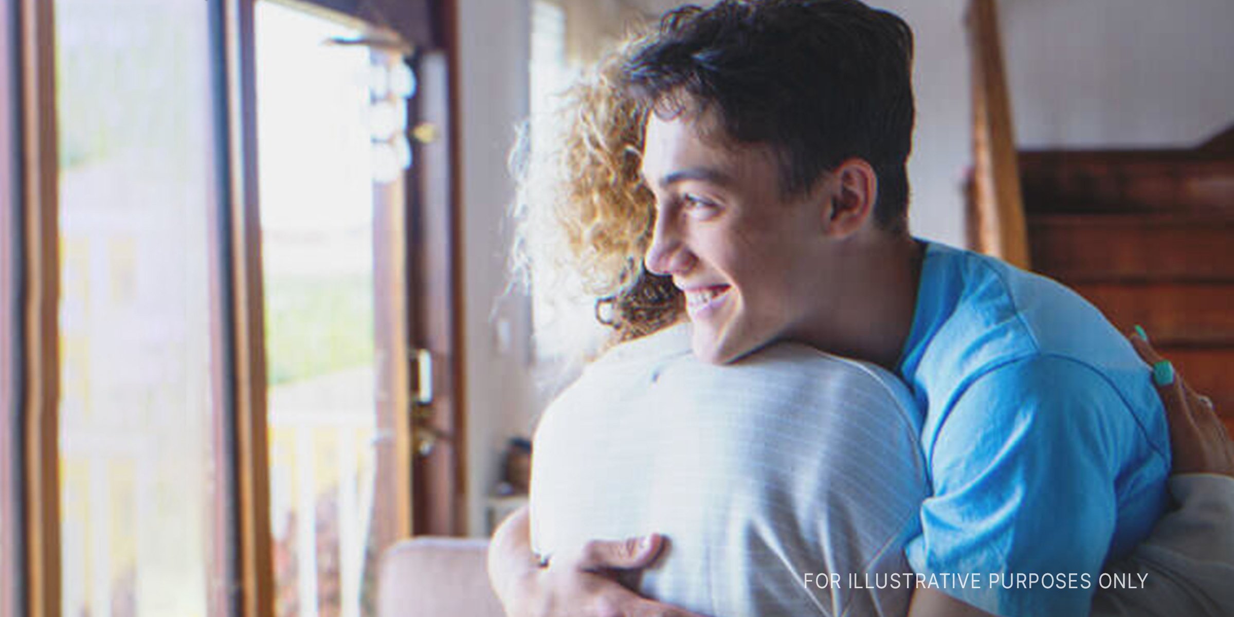 Teenage Boy Hugging His Mother. | Source: Shutterstock