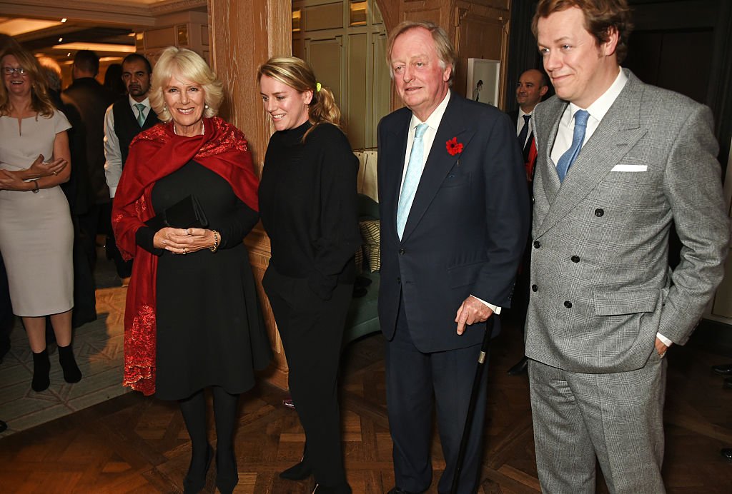 Camilla, Duchess of Cornwall, Laura Lopes, Andrew Parker Bowles and Tom Parker Bowles attend the launch of "Fortnum & Mason: The Cook Book" by Tom Parker Bowles at Fortnum & Mason on October 18, 2016 in London, England. | Photo: Getty Images