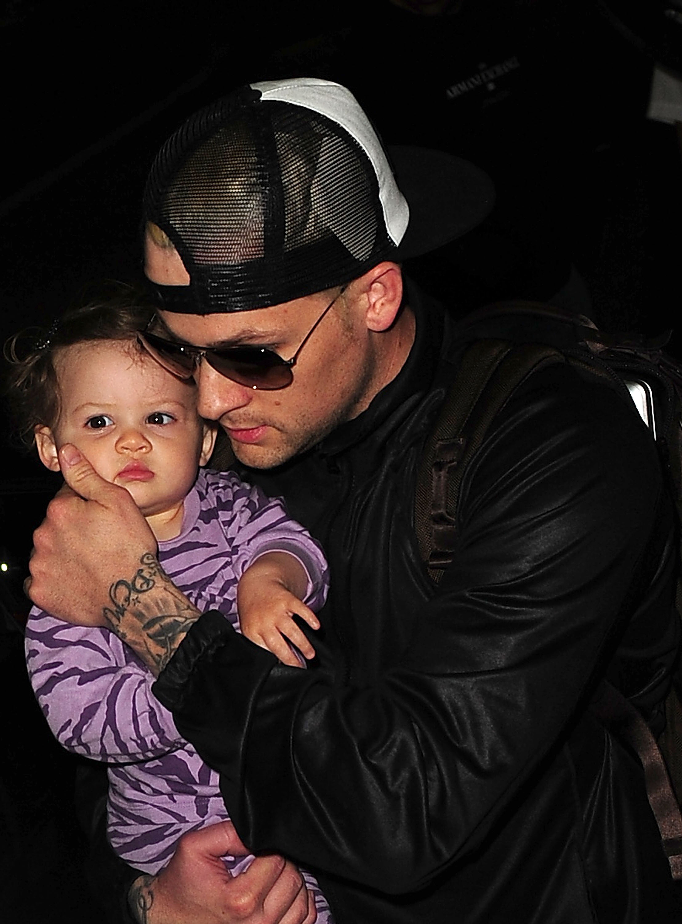 Harlow Winter Kate Madden and Joel Madden are seen on May 4, 2009 in Miami Beach, Florida | Source: Getty Images
