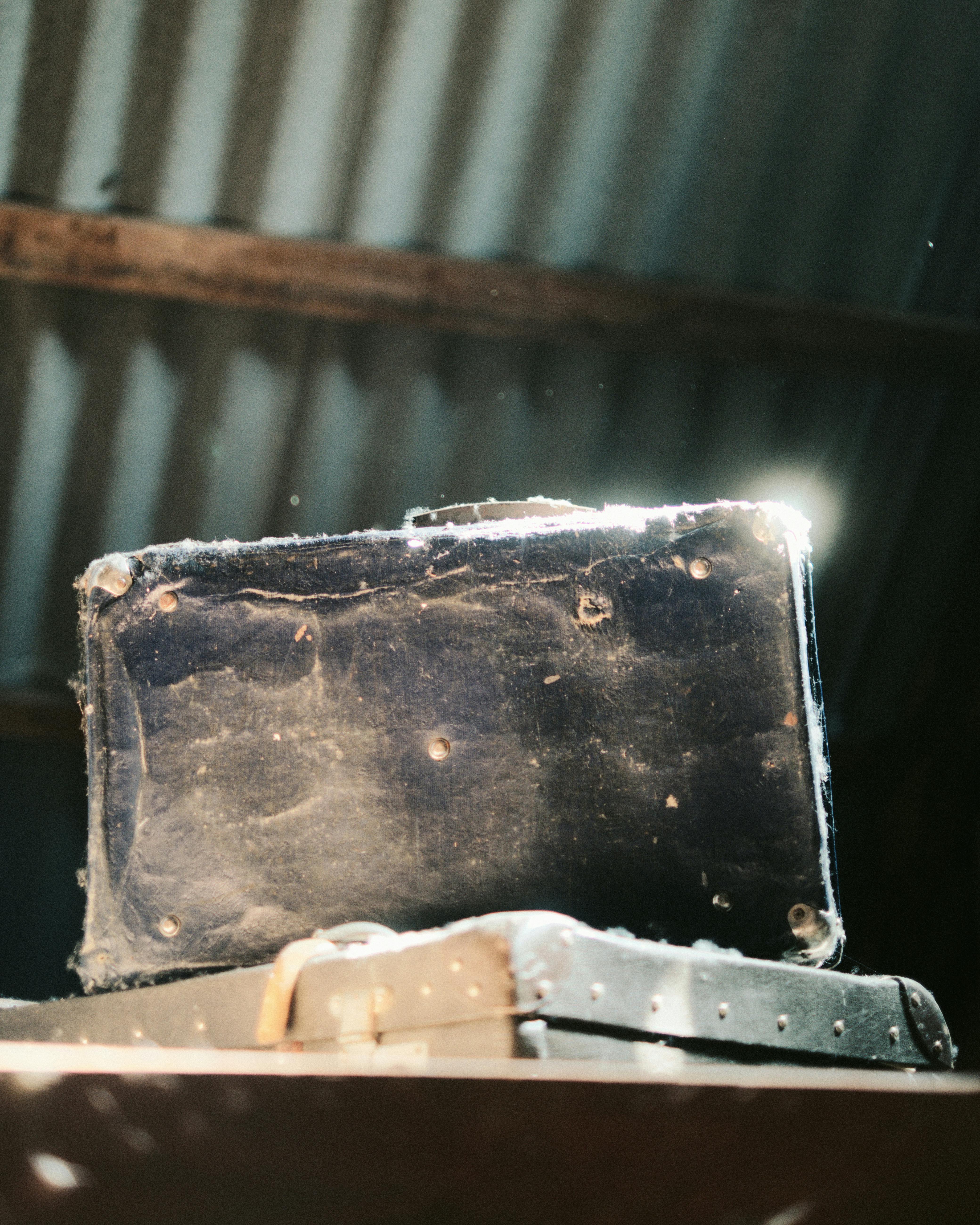 Old suitcases in an attic | Source: Pexels