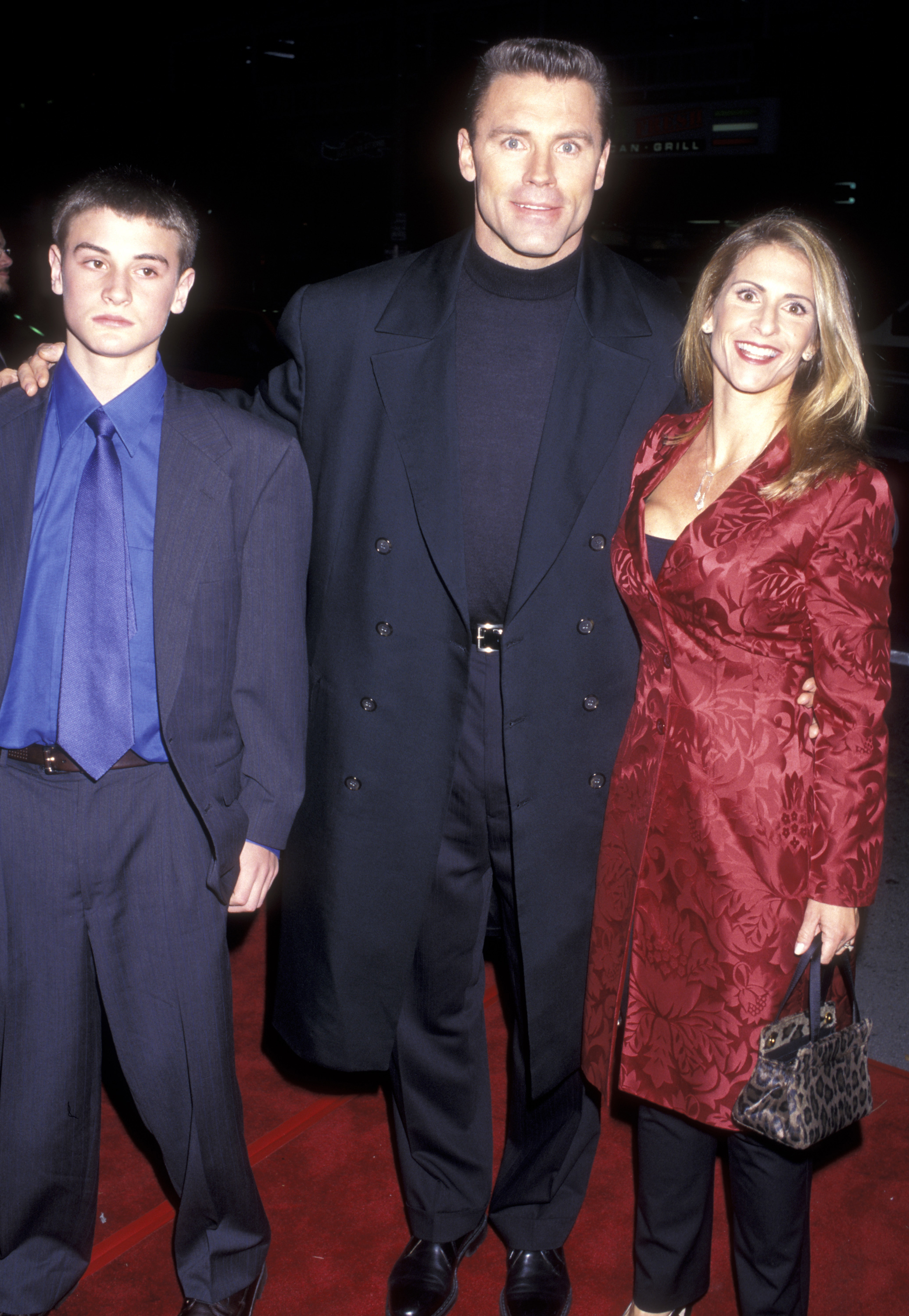 Howie Long, his wife Diane Addonizio, and their son Christopher Long at the "Firestorm" premiere on January 7, 1998, in Westwood, California | Source: Getty Images