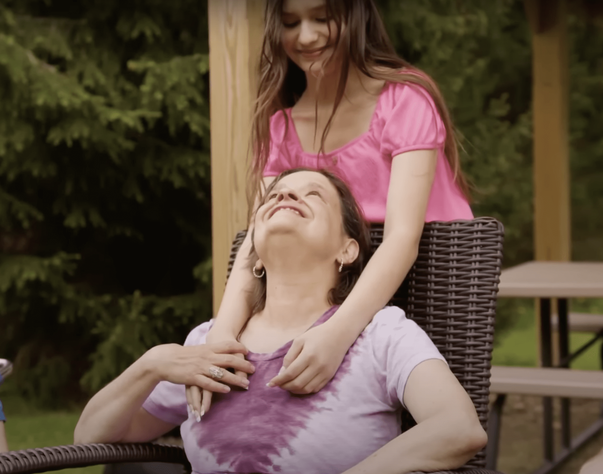 Annie and her mom, Cathy, holding each other | Source: Youtube/CBN News