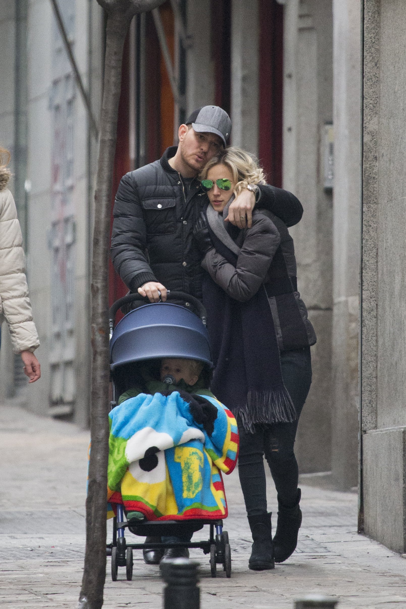 Michael Buble and Luisana Lopilato are seen strolling with their son Noah on February 12, 2015, in Madrid, Spain. | Source: Iconic/GC Images/Getty Images