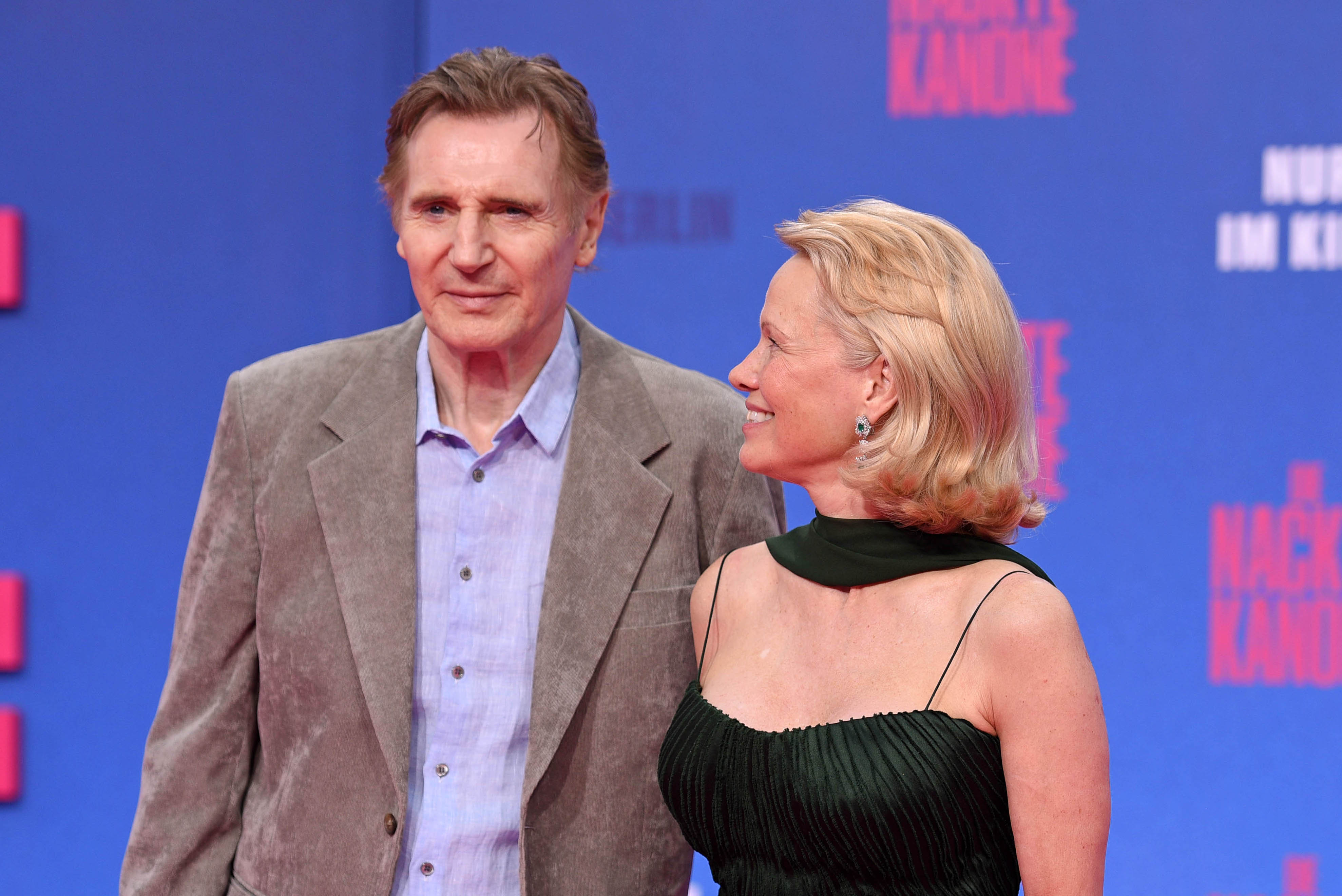 Liam Neeson and Pamela Anderson attend the Berlin premiere of "The Naked Gun," 2025 | Source: Getty Images