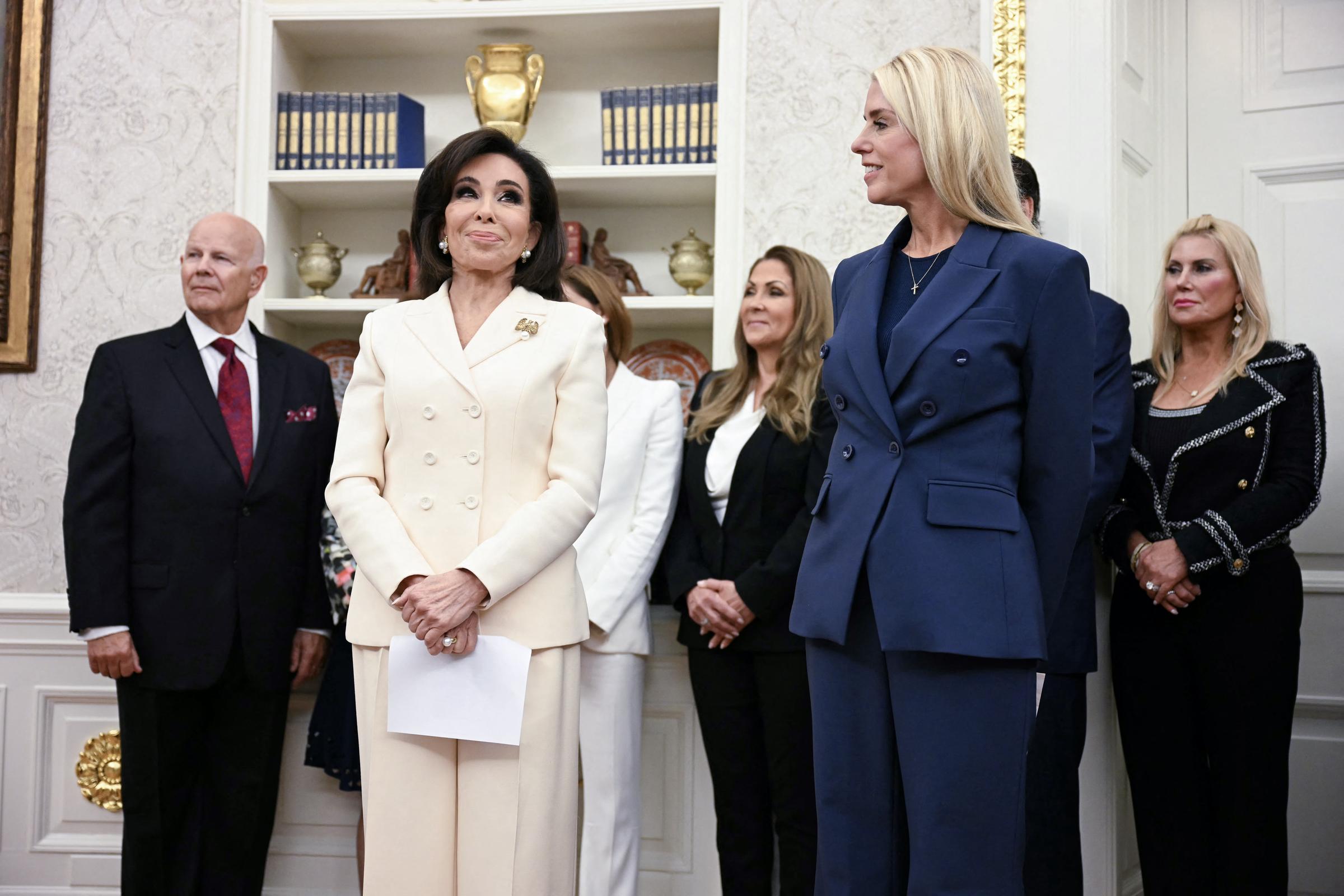 Interim U.S. Attorney for Washington, D.C. Jeanine Pirro stands during her swearing-in ceremony in the Oval Office on May 28, surrounded by supporters and colleagues.