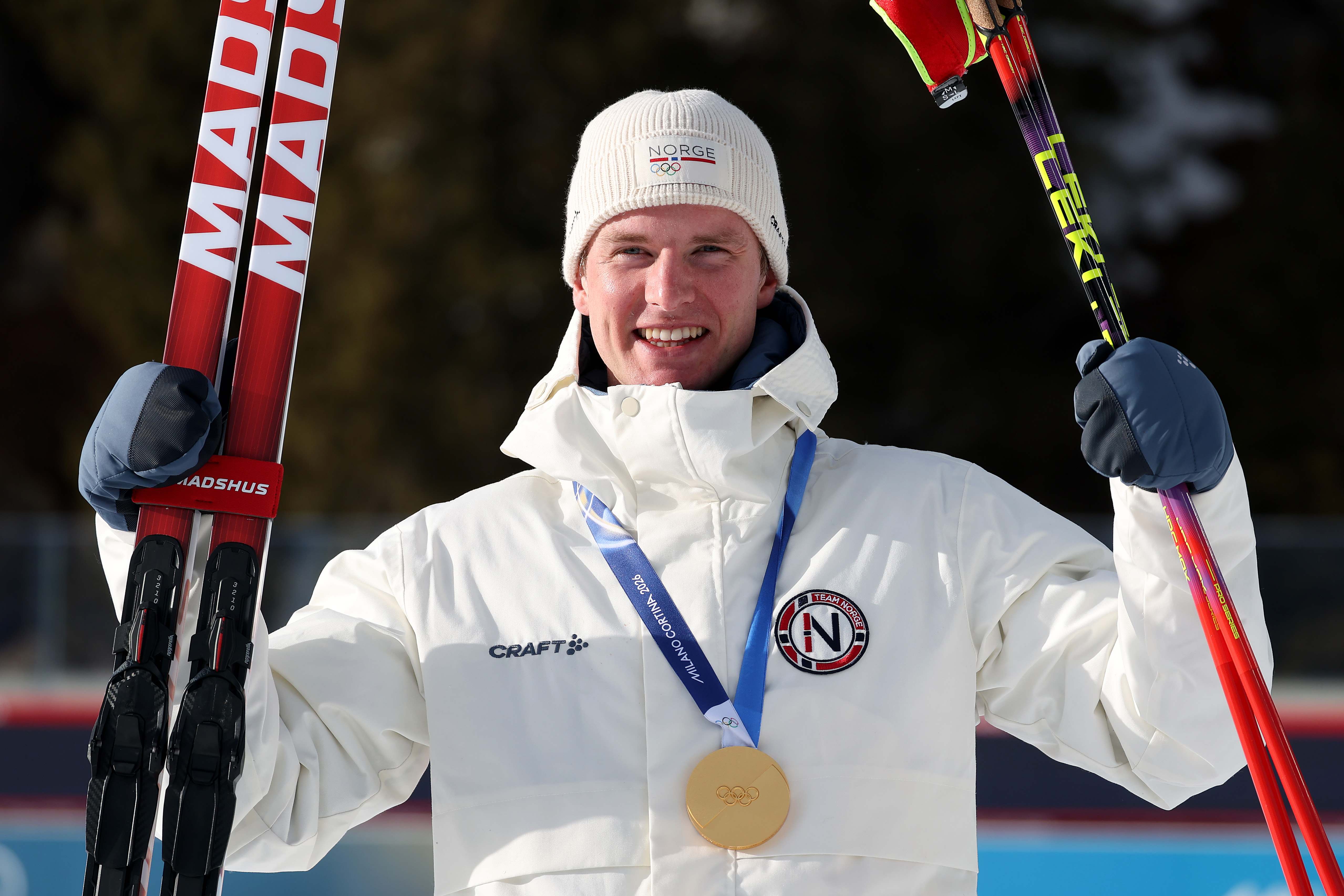 Gold medalist Johan-Olav Botn of Team Norway celebrates on the podium during the medal ceremony for the Men's 20km Individual on day four of the Milano Cortina 2026 Winter Olympic games at Anterselva Biathlon Arena in Italy on February 10. | Source: Getty Images