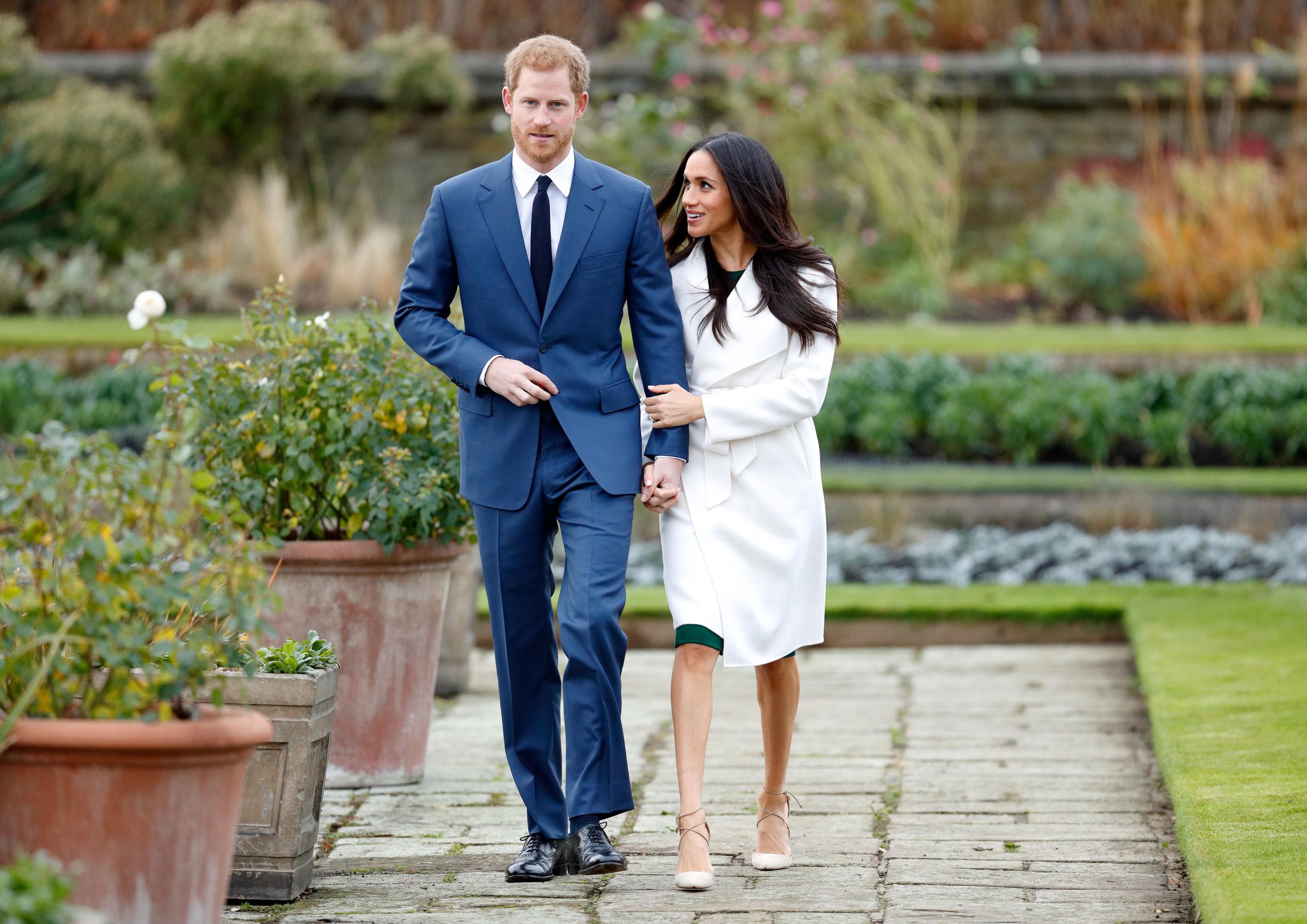 Prince Harry and Meghan Markle attend a photocall in the Sunken Gardens on November 27, 2017, in London, England. | Source: Getty Images