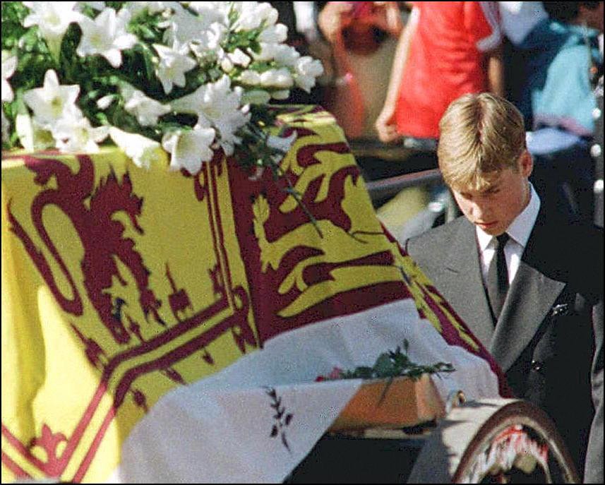 Prince William walks with his head bowed behind the coffin of his mother Diana, Princess of Wales draped in the Royal Standard, on its way to London's Westminster Abbey for the funeral ceremony on September 6, 1997 in London, England | Source: Getty Images