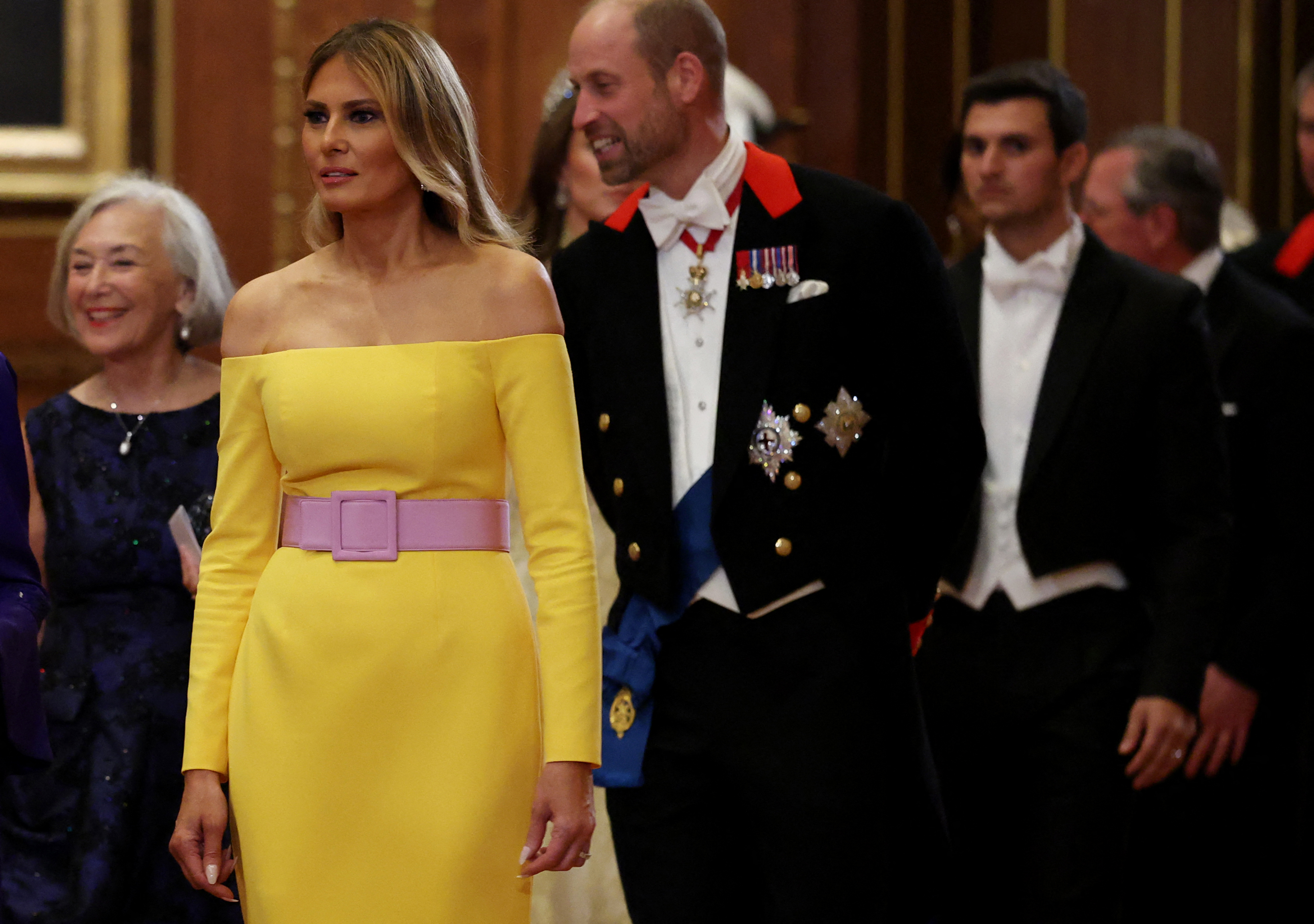 Melania Trump walking ahead of Prince William at the State Banquet. | Source: Getty Images