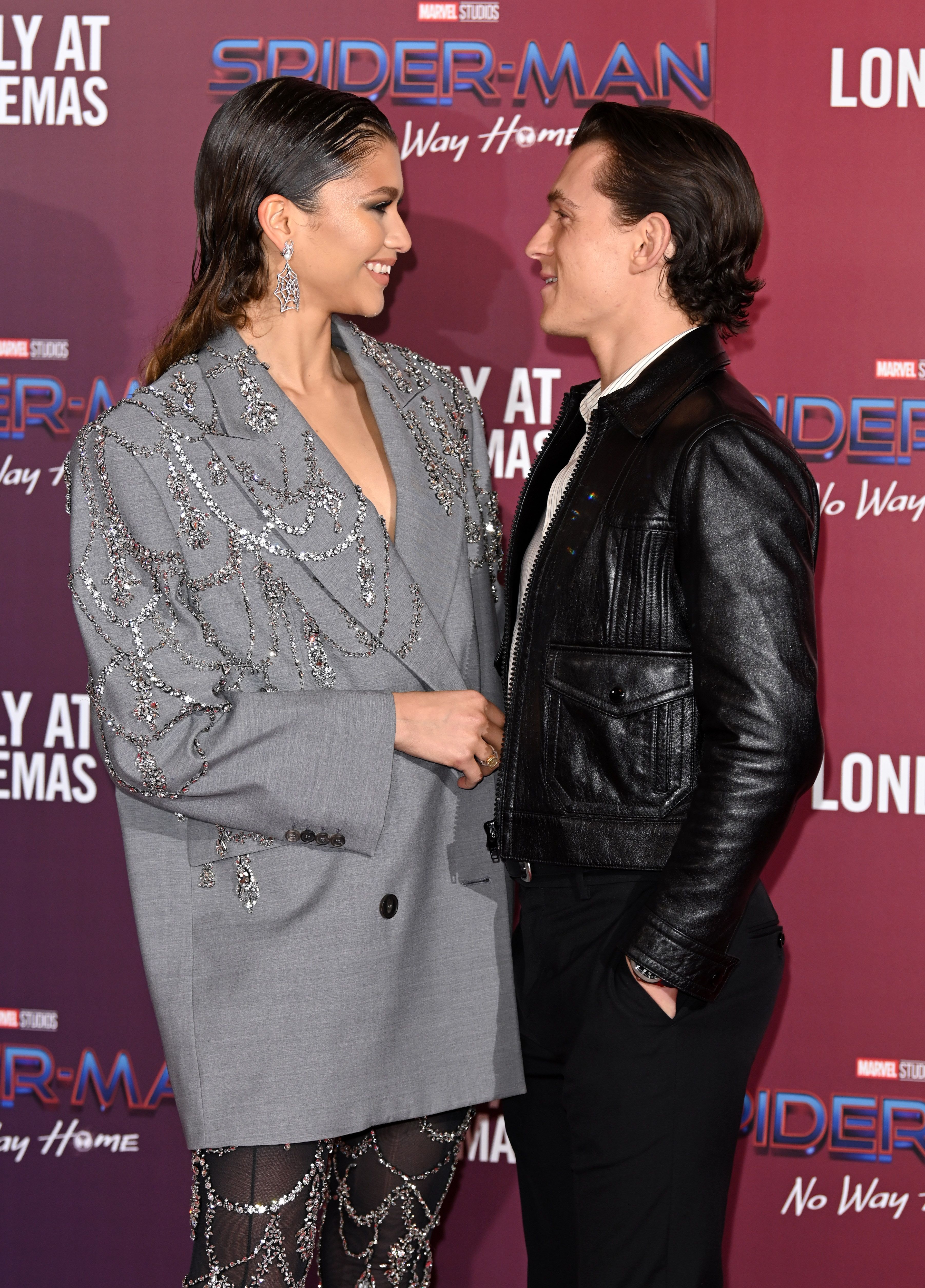 Zendaya and Tom Holland during a photocall for "Spiderman: No Way Home" at The Old Sessions House on December 05, 2021 in London, England. | Source: Getty Images