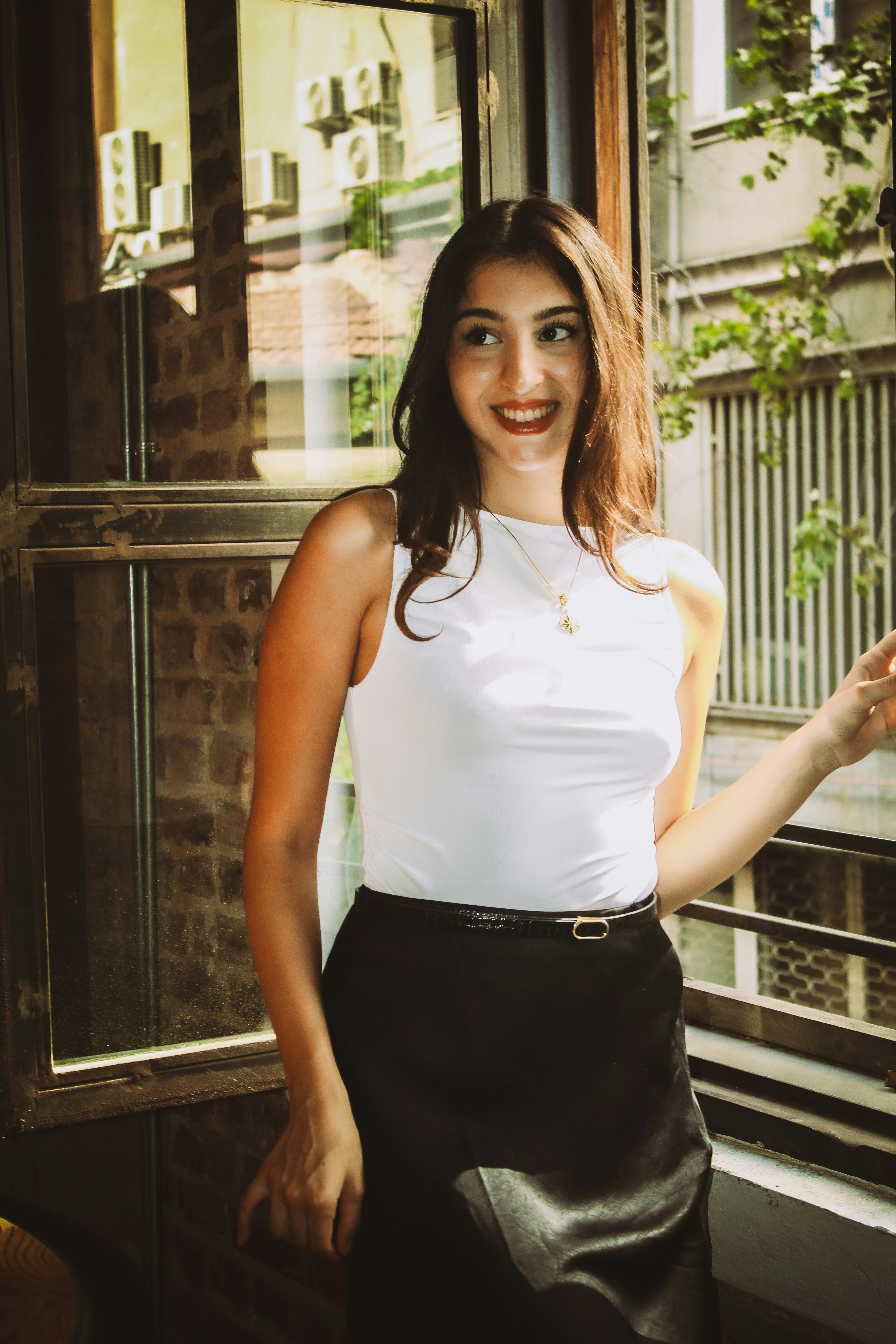 A woman smiling | Source: Pexels