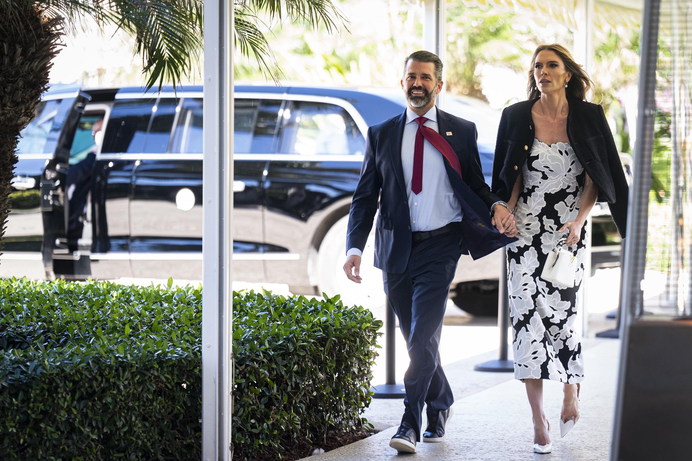 Donald Trump Jr., and his fiancee Bettina Anderson, arrive at Mar-a-Lago in Palm Beach, Florida on February 1, 2026. | Source: Getty Images