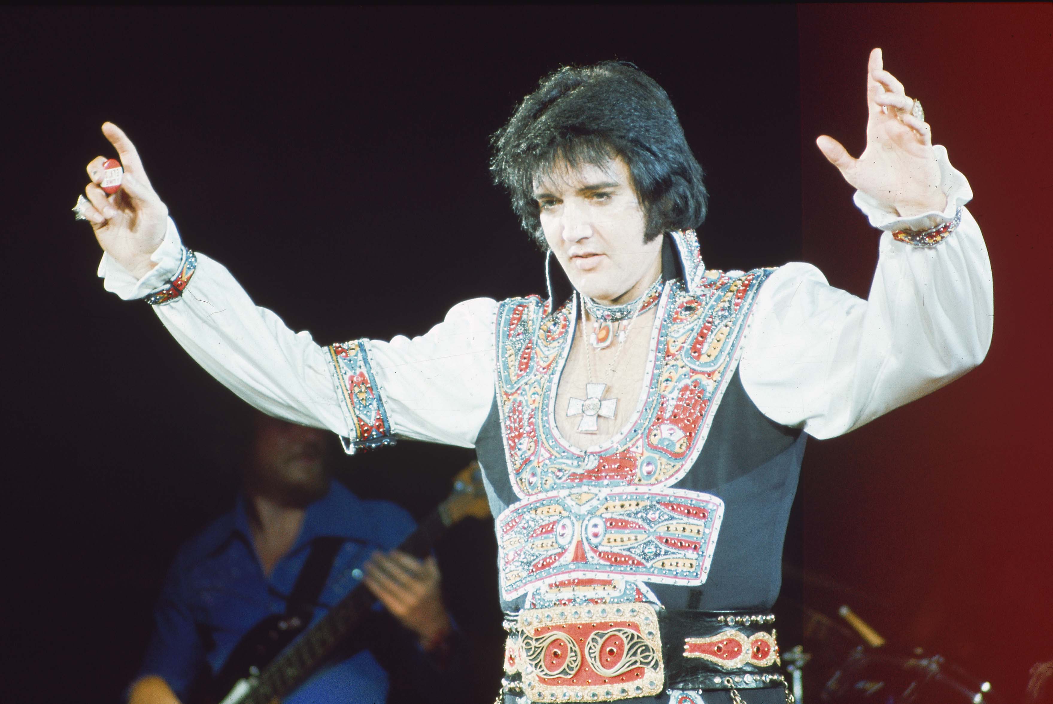 Elvis Presley performing on stage in 1975 | Source: Getty Images