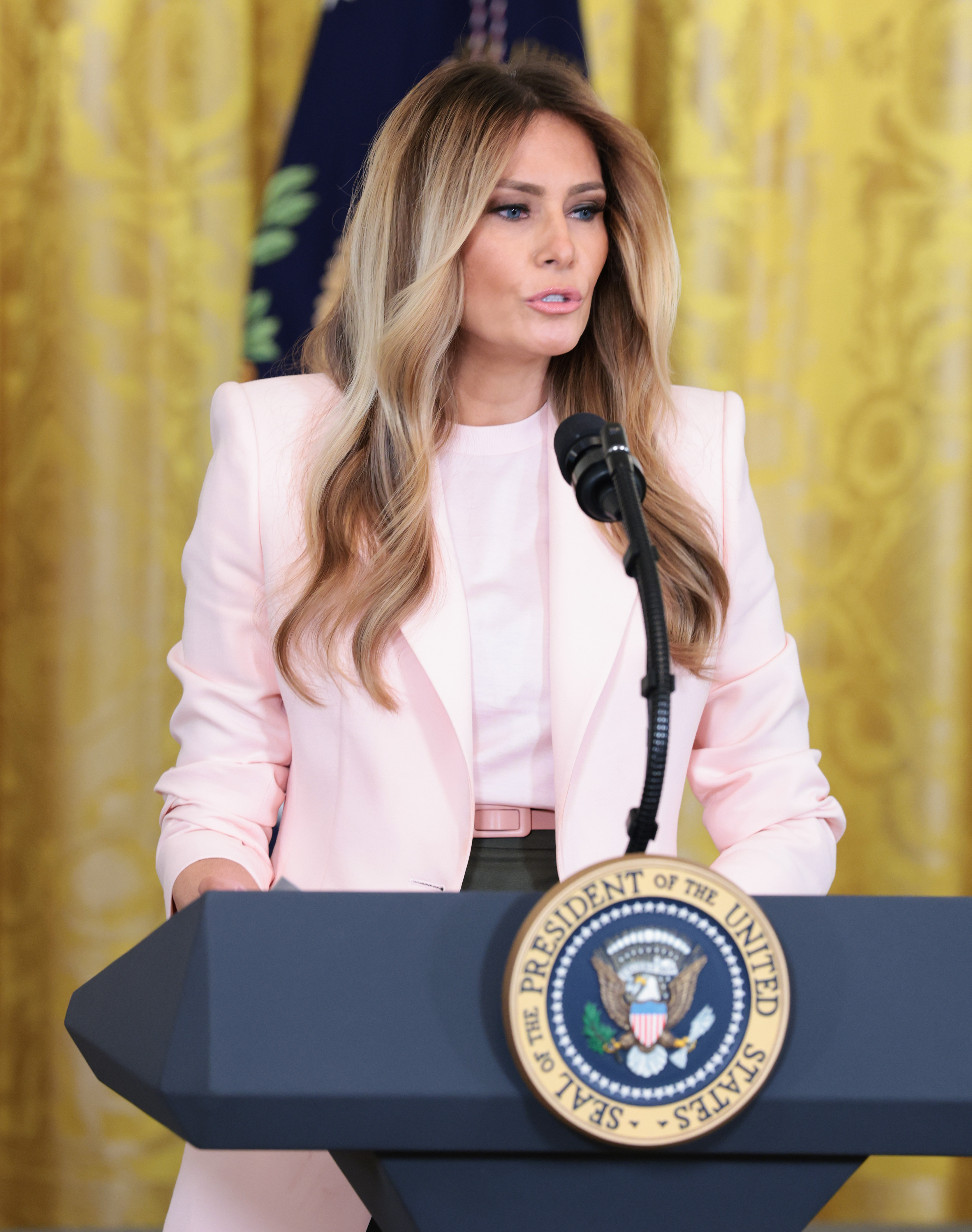 Melania Trump makes a statement alongside Donald Trump during a military mothers celebration at the White House on May 6, 2026, in Washington, DC | Source: Getty Images