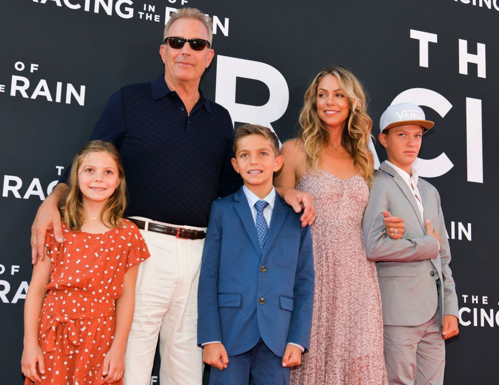 Grace Avery Costner, Kevin Costner, Hayes Logan Costner, Christine Baumgartner, and Cayden Wyatt Costner during the premiere of 20th Century Fox's "The Art of Racing in the Rain" at El Capitan Theatre on August 01, 2019 in Los Angeles, California. | Source: Getty Images