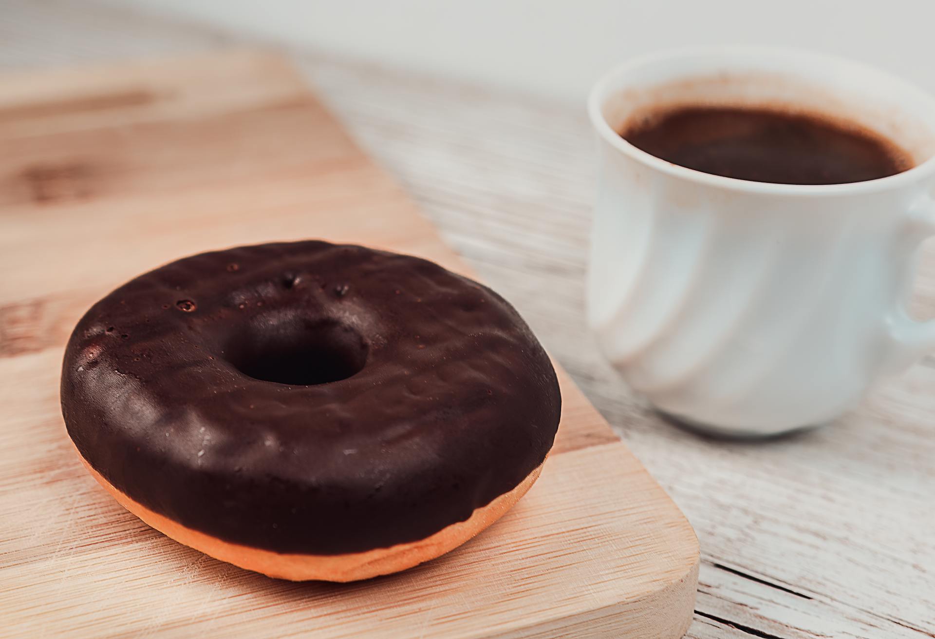Chocolate donut and coffee | Source: Pexels