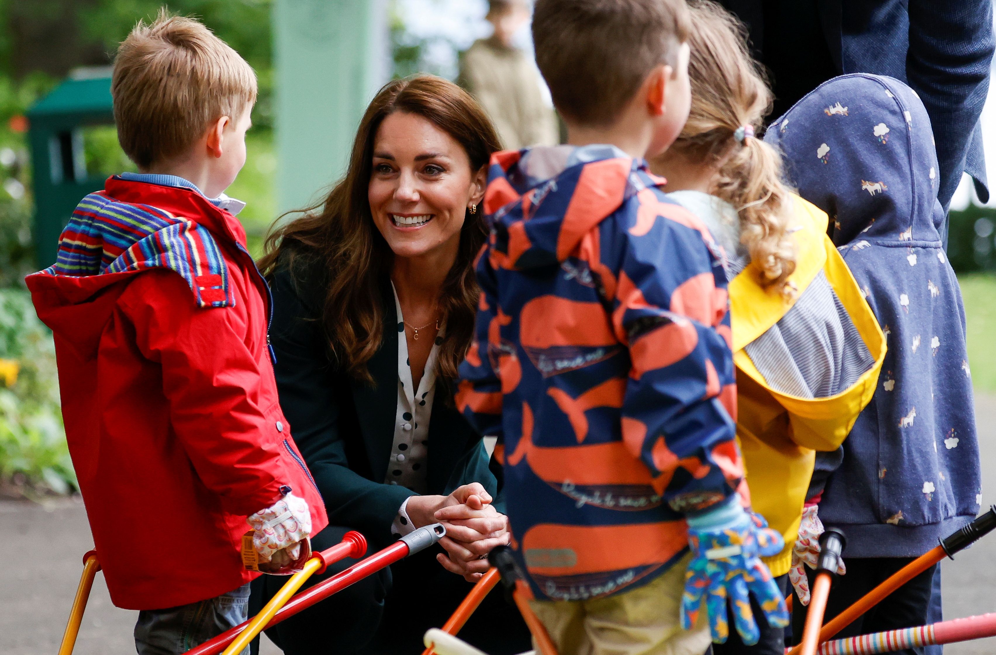 Catherine, Duchess of Cambridge speaks to children from Edzell Nursery during a visit to Starbank Park on May 27, 2021 in Edinburgh, Scotland. | Source: Getty Images