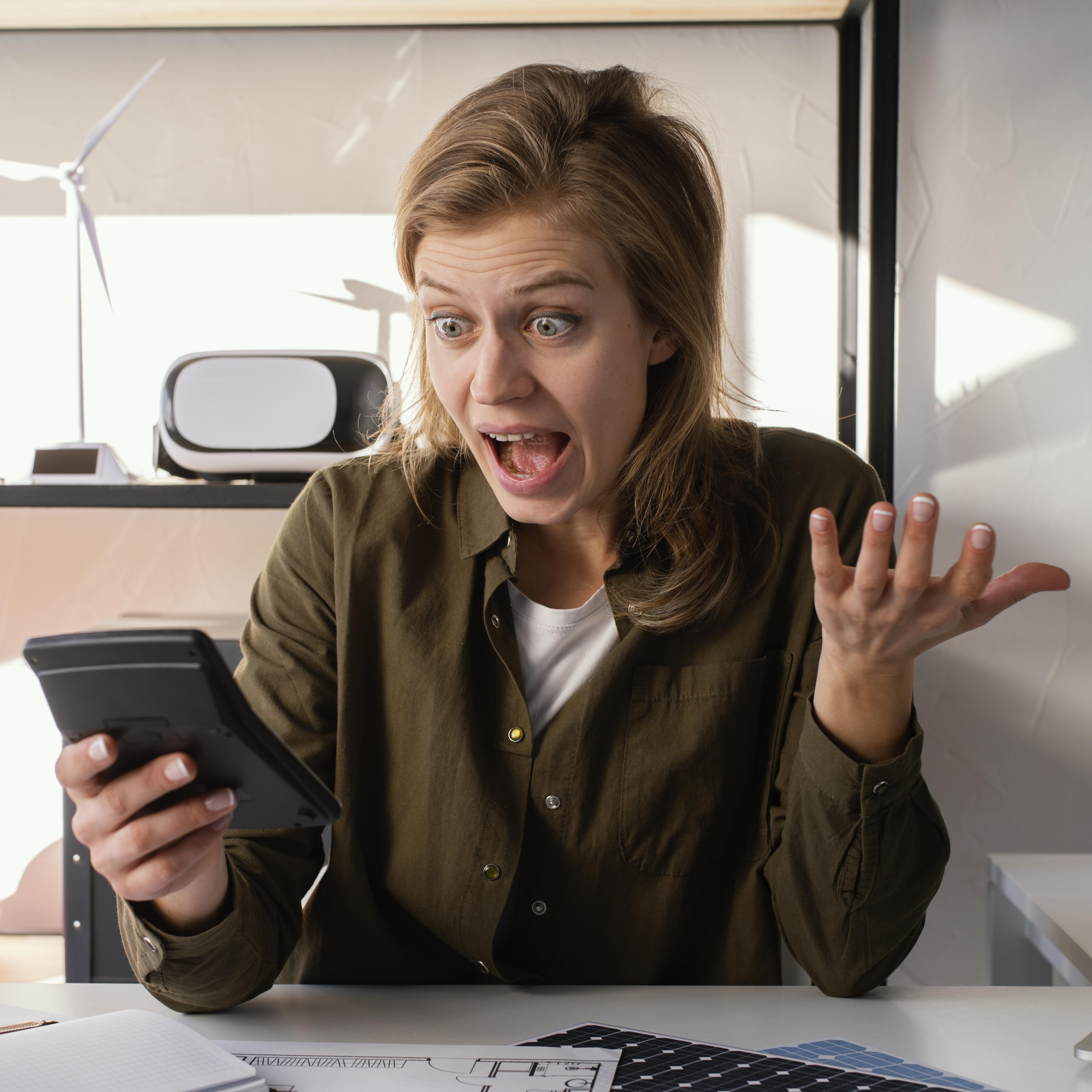 A shocked woman in a bank | Source: Freepik