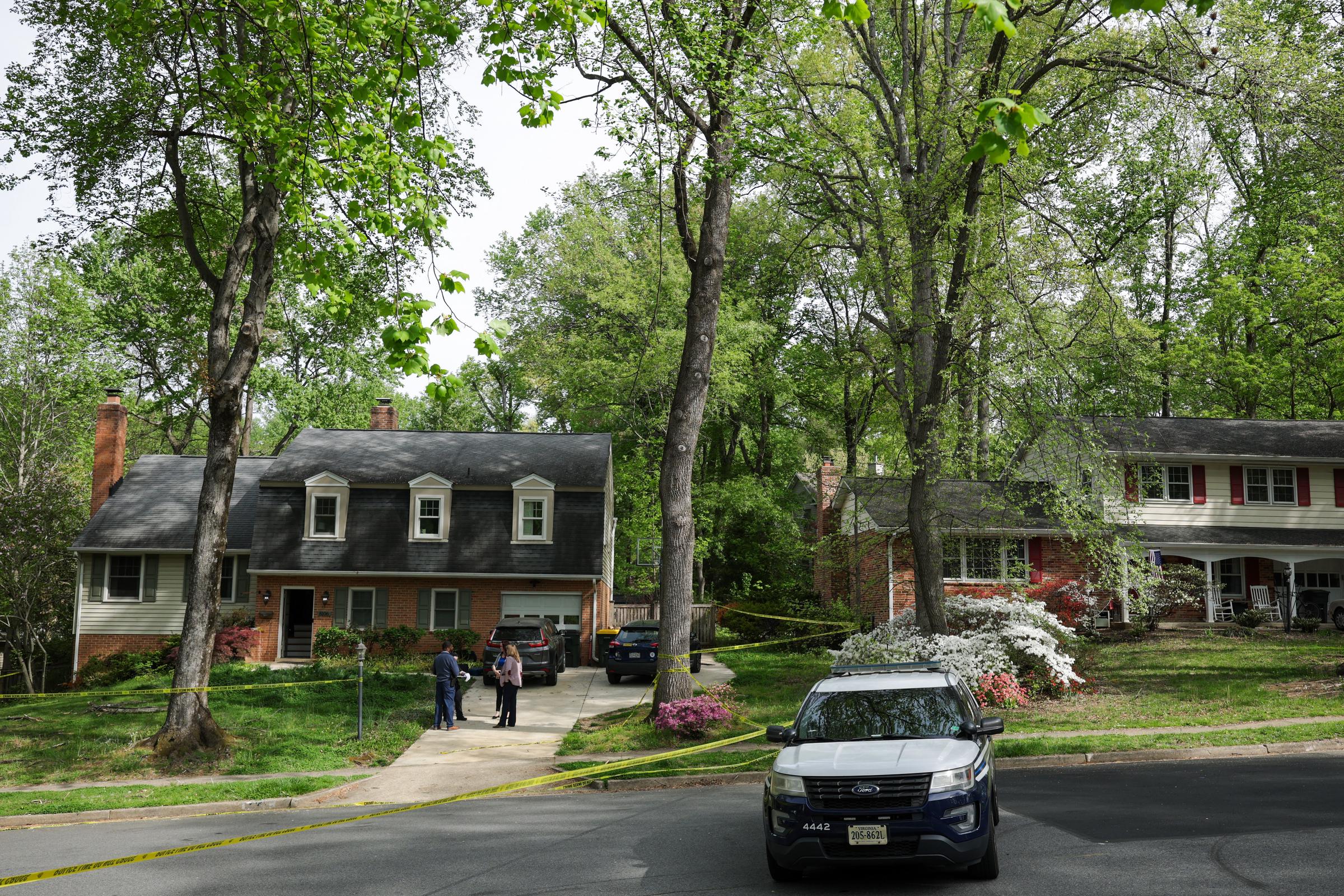 A wide view shows the Fairfax home and surrounding neighborhood as authorities maintain the perimeter in Annandale, Virginia on April 16, 2026 | Source: Getty Images