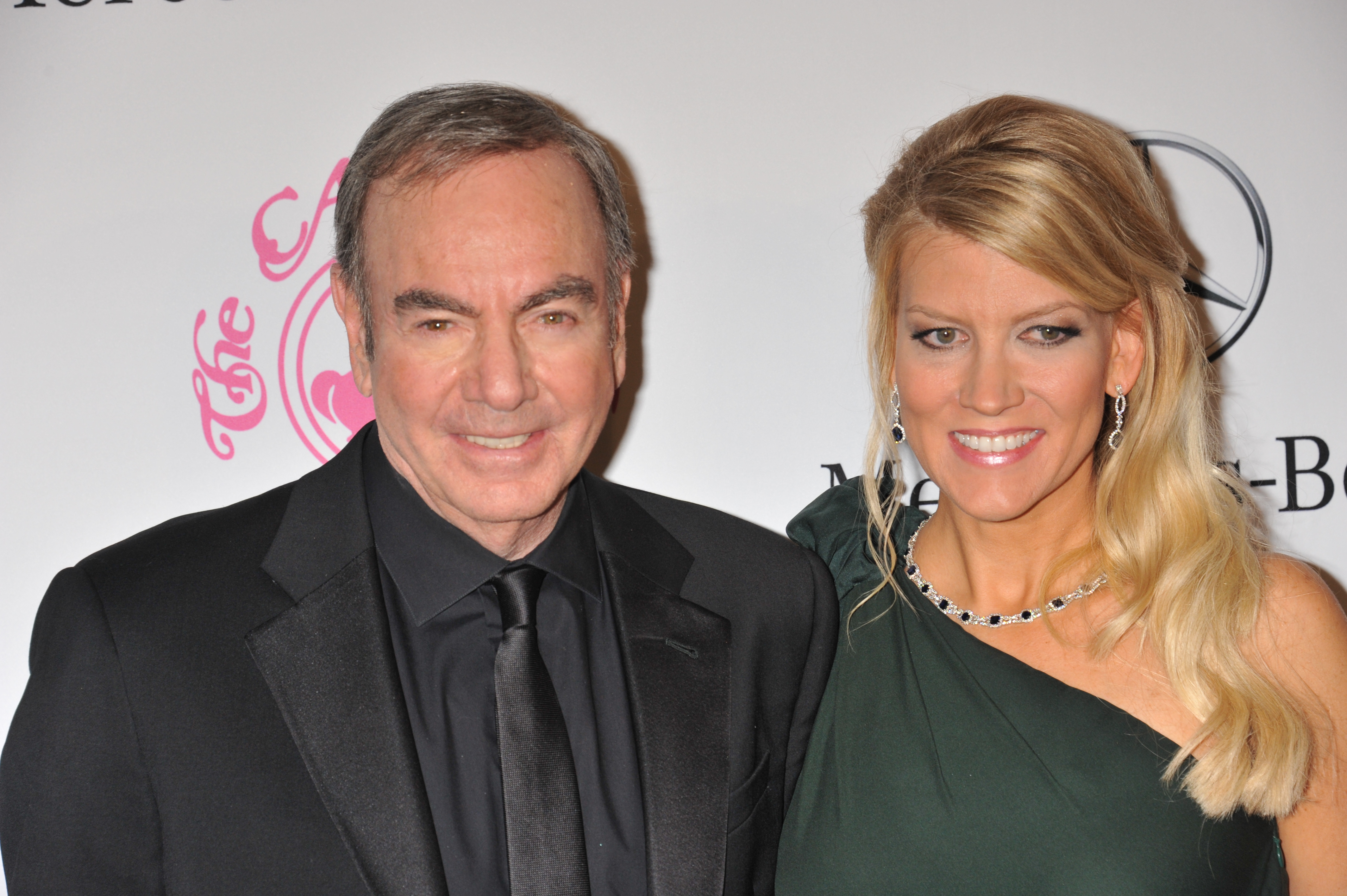 The singer and Katie McNeil arrive at the 26th Carousel of Hope Gala in 2012. | Source: Getty Images