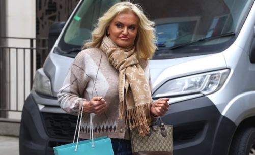 Photographed walking through central London with shopping bags in hand, Danniella Westbrook showcased her updated profile following a full face, neck, and brow lift. Her blonde hair fell in a voluminous blow dry as she passed a parked van, offering a wider glimpse of her post-surgery appearance during the Mayfair outing. | Source: Facebook/Brit Celeb Vibes
