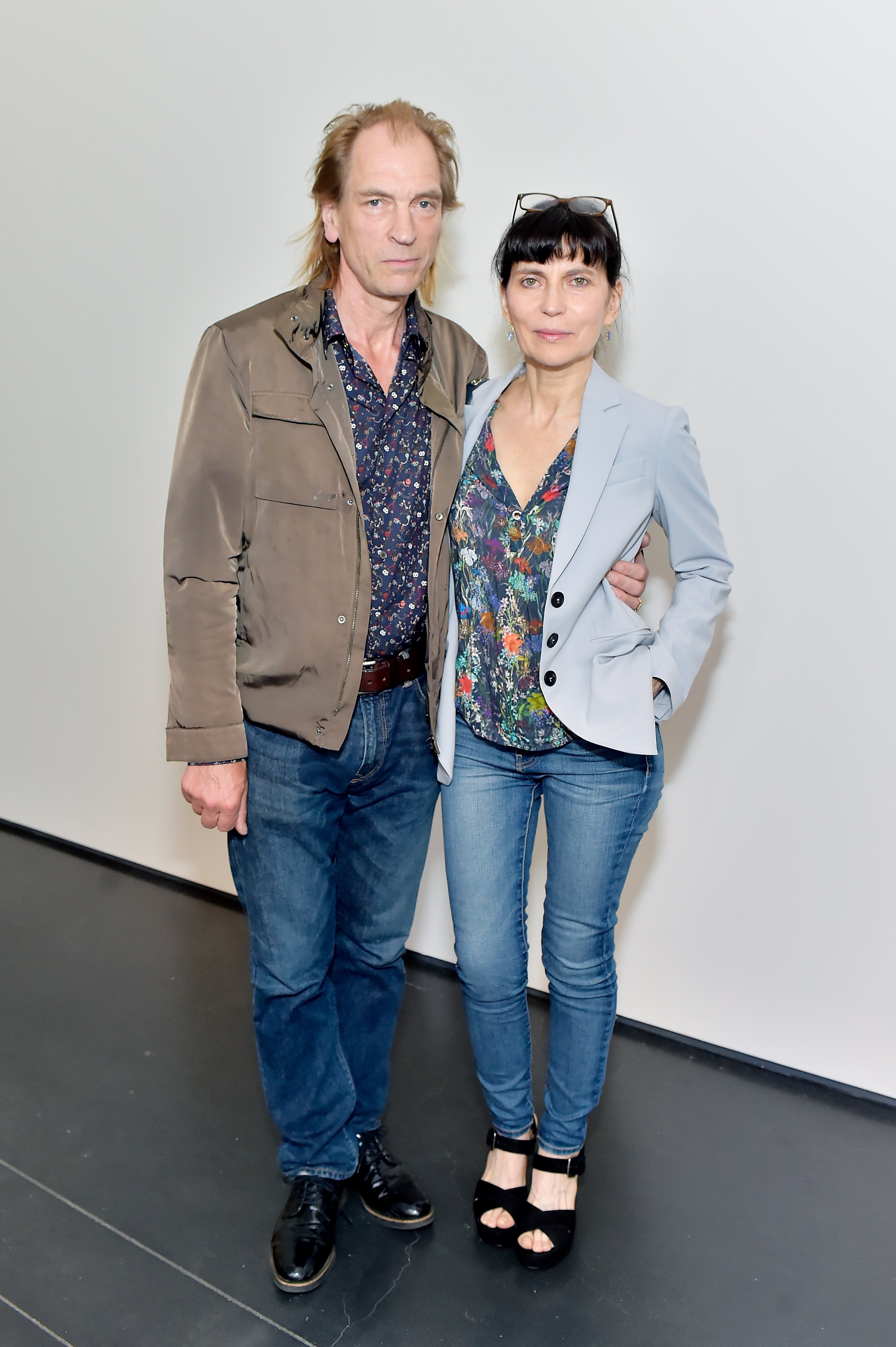 Julian Sands and Evgenia Citkowitz pose at LACMA Director's Circle Celebrates The Wear LACMA Spring 2018 Collection With Designs By LFrank and THEGREAT. at LACMA on June 6, 2018, in Los Angeles, California | Source: Getty Images