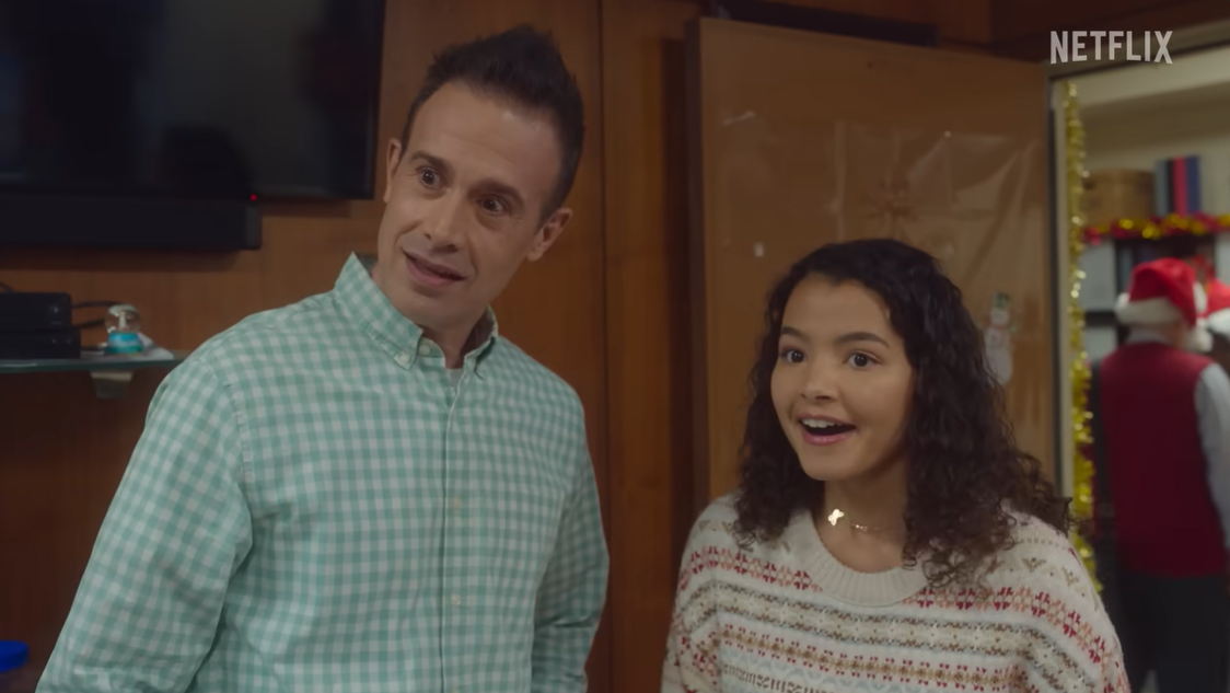 Freddie Prinze Jr. and Deja Monique Cruz in the holiday film, "Christmas with You," posted on October 19, 2022 | Source:  YouTube/Netflix