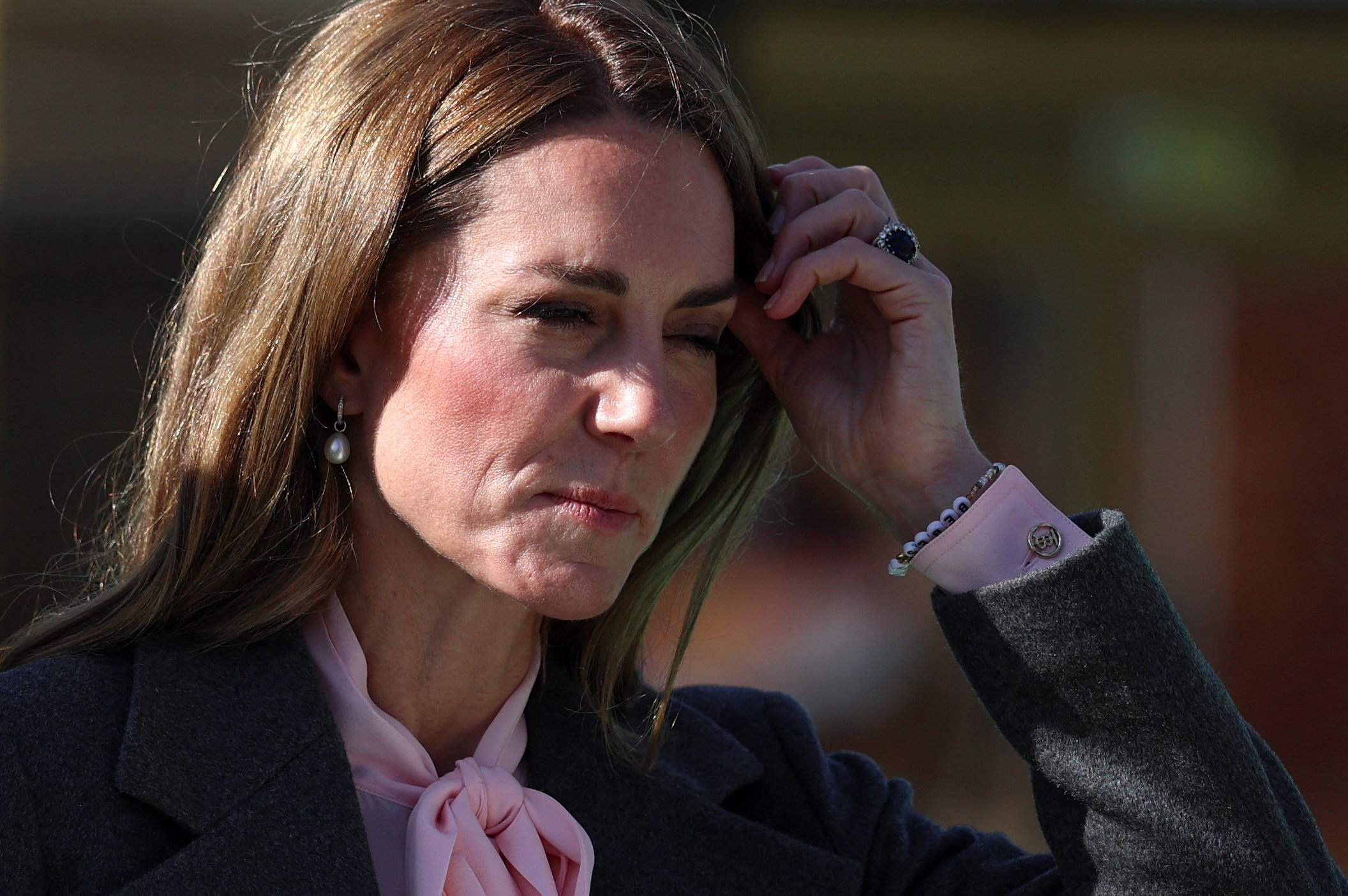 Catherine, Princess of Wales, wears a bracelet with Bebe's name on it during a visit to Southport, England, on September 23, 2025 | Source: Getty Images