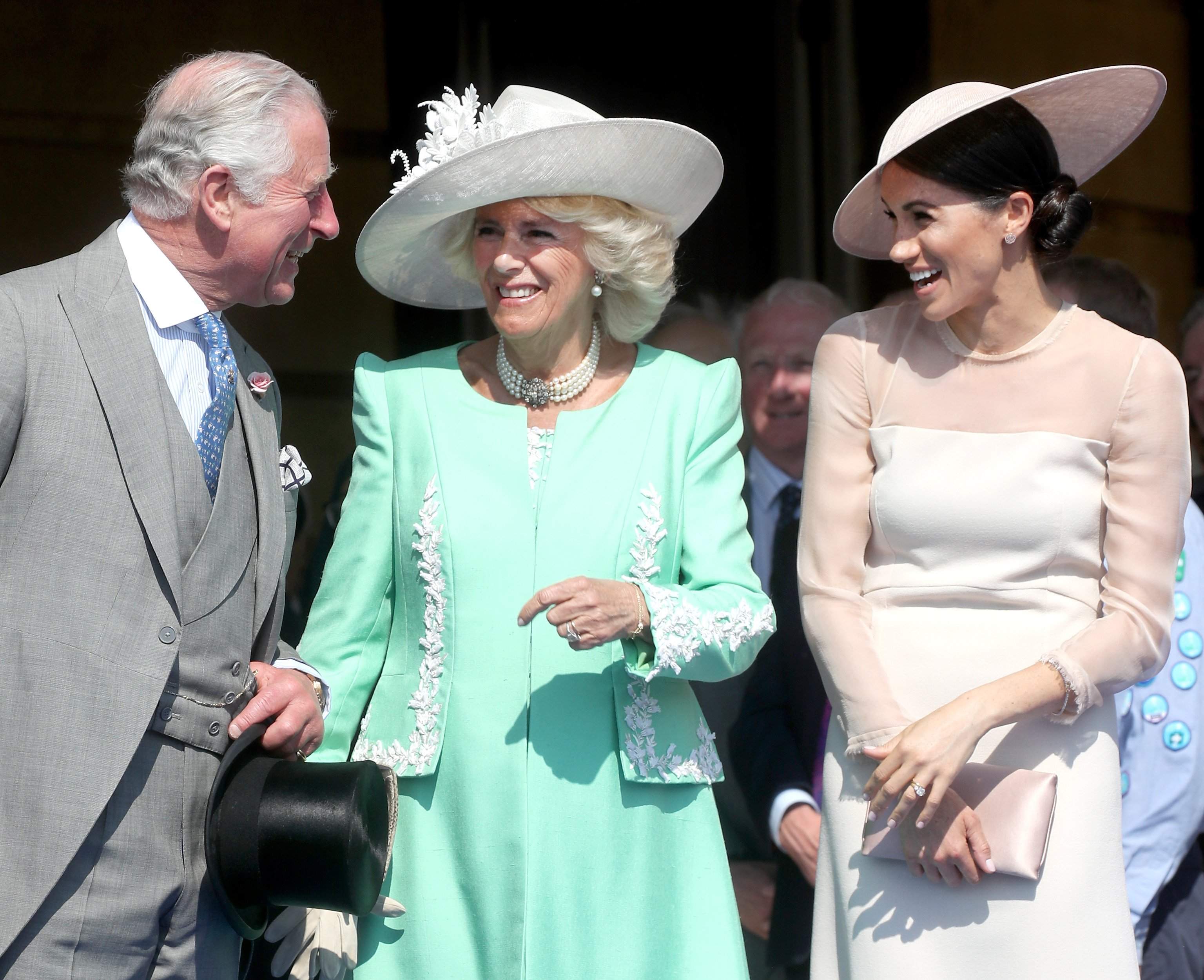 King Charles lll, Camilla, Queen Consort and Meghan, Duchess of Sussex at King Charles' 70th Birthday Patronage Celebration at Buckingham Palace on May 22, 2018 in London, England. | Source: Getty Images