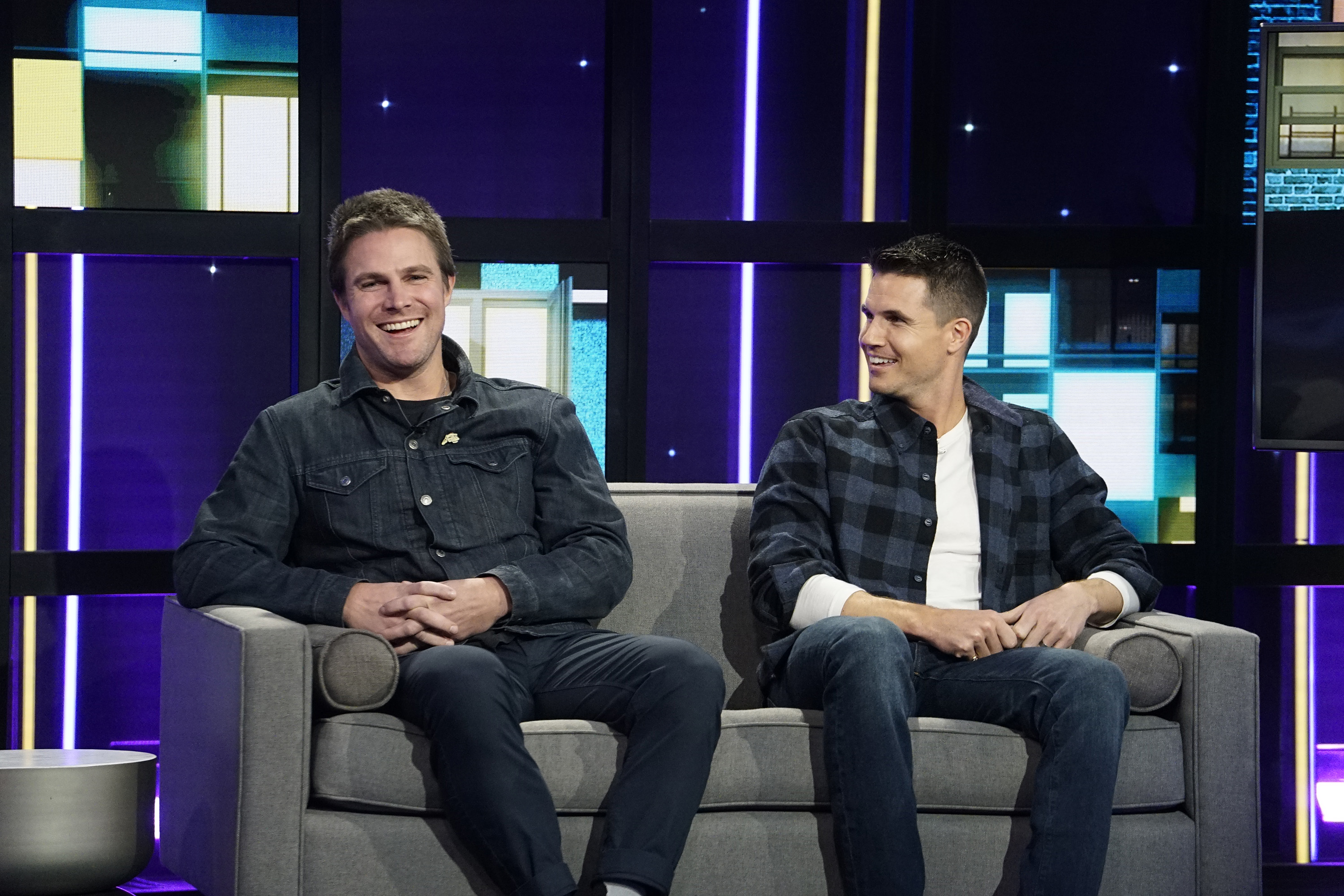 Stephen Amell and Robbie Amell on "A Little Late With Lilly Singh" on December 6, 2019. | Source: Getty Images