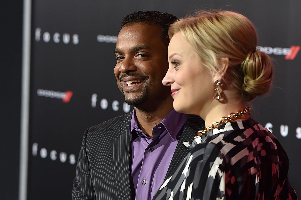 Actor Alfonso Ribeiro (L) and wife Angela Unkrich attend the premiere of Warner Bros. Pictures' "Focus" at TCL Chinese Theatre | Photo: Getty Images