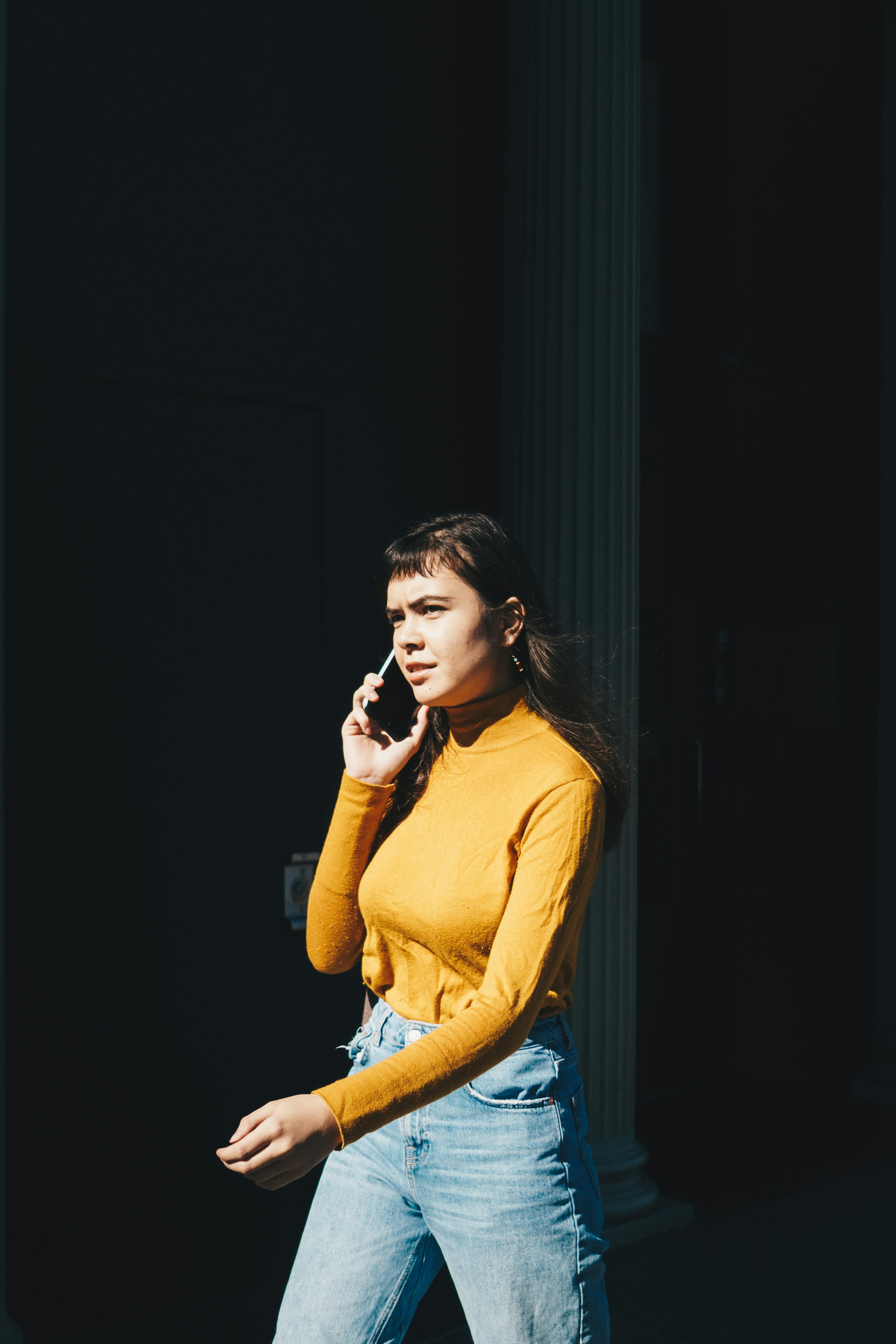 Woman talking on phone | Source: Unsplash