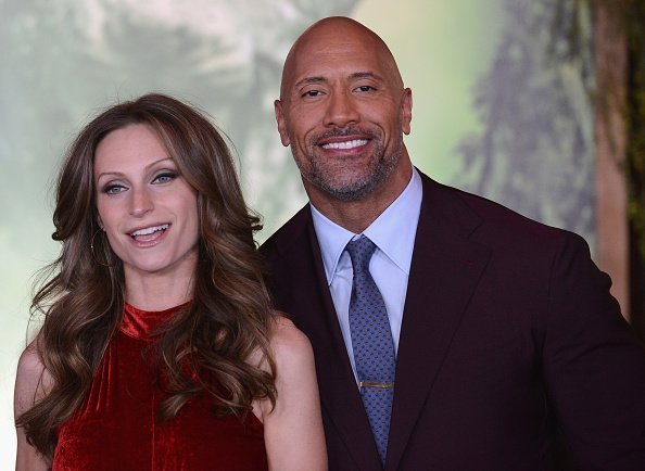 Actor Dwayne "The Rock" Johnson and Lauren Hashian arrive for the Premiere Of Columbia Pictures' "Jumanji: Welcome To The Jungle" held at The TLC Chinese Theater on December 11, 2017 in Hollywood, California | Photo: Getty Images