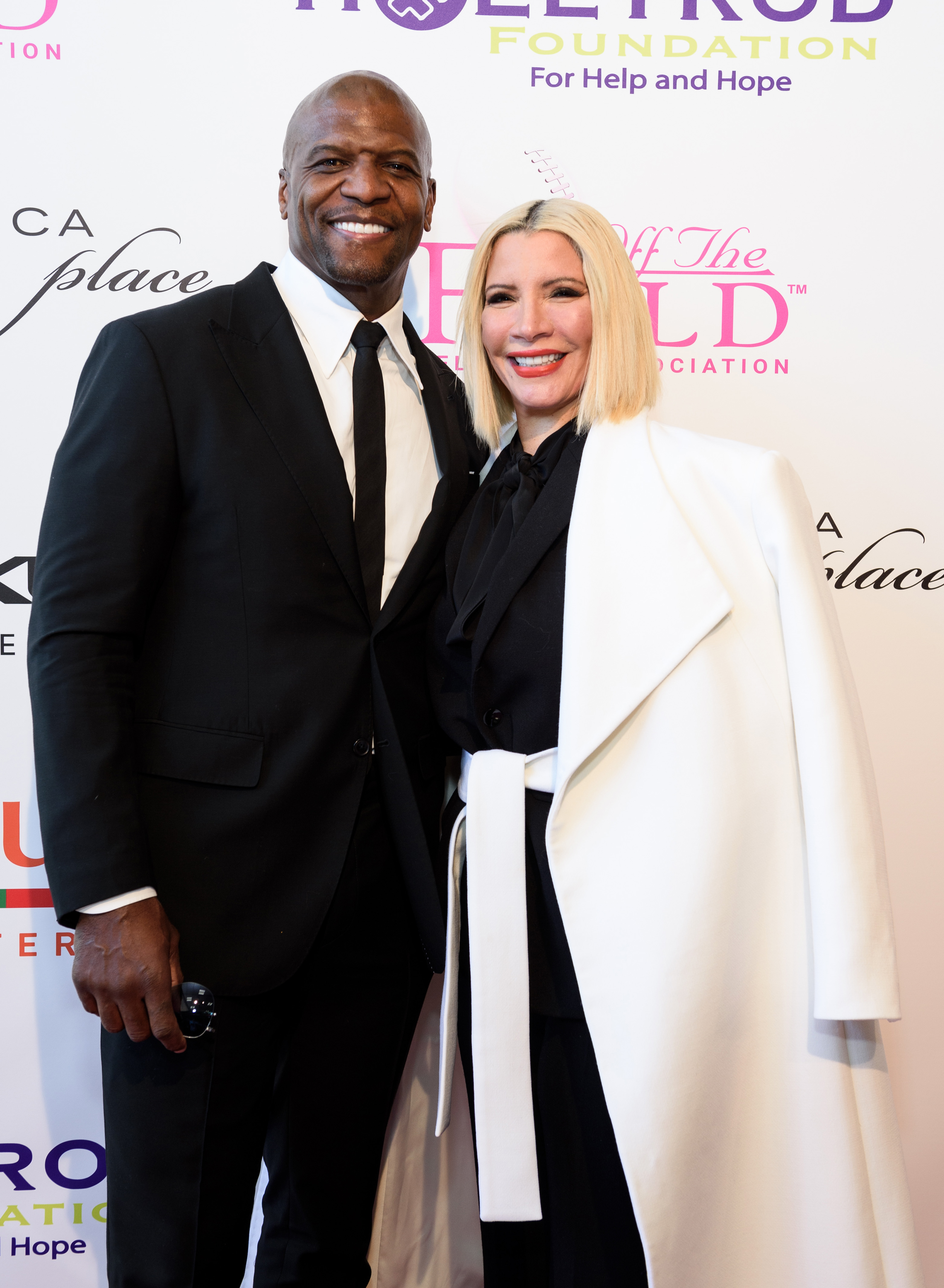 Terry and Rebecca Crews attend the 21st Annual NFL Players' Wives Association charity fashion show at Santa Monica Place on February 11, 2022 in California | Source: Getty Images