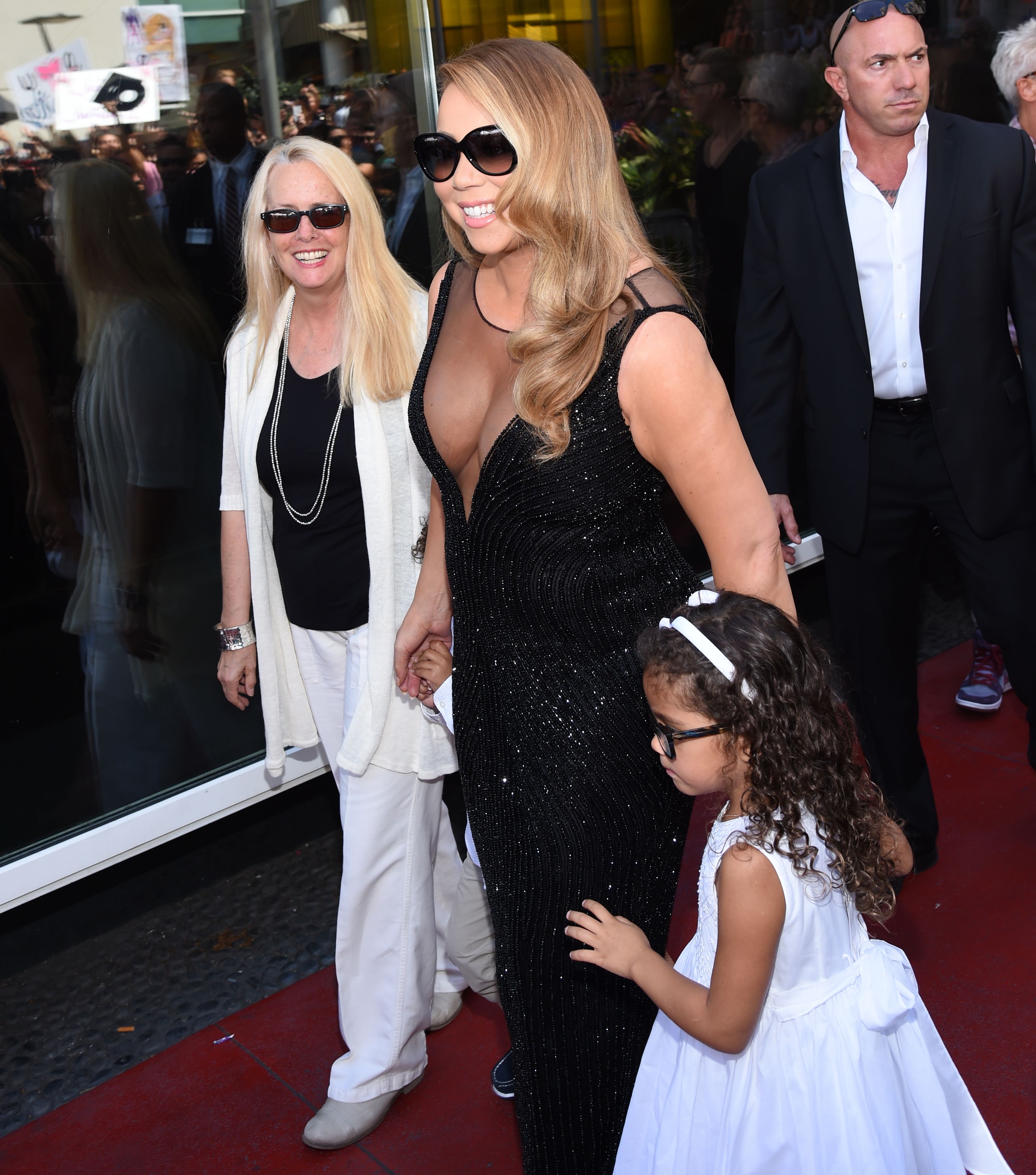 Patricia Hickey, Mariah Carey, and Moroccan and Monroe Cannon as Mariah is Mariah Carey honoured with star on Hollywood Walk of Fame, in Los Angeles, on August 5, 2015 | Source: Getty Images