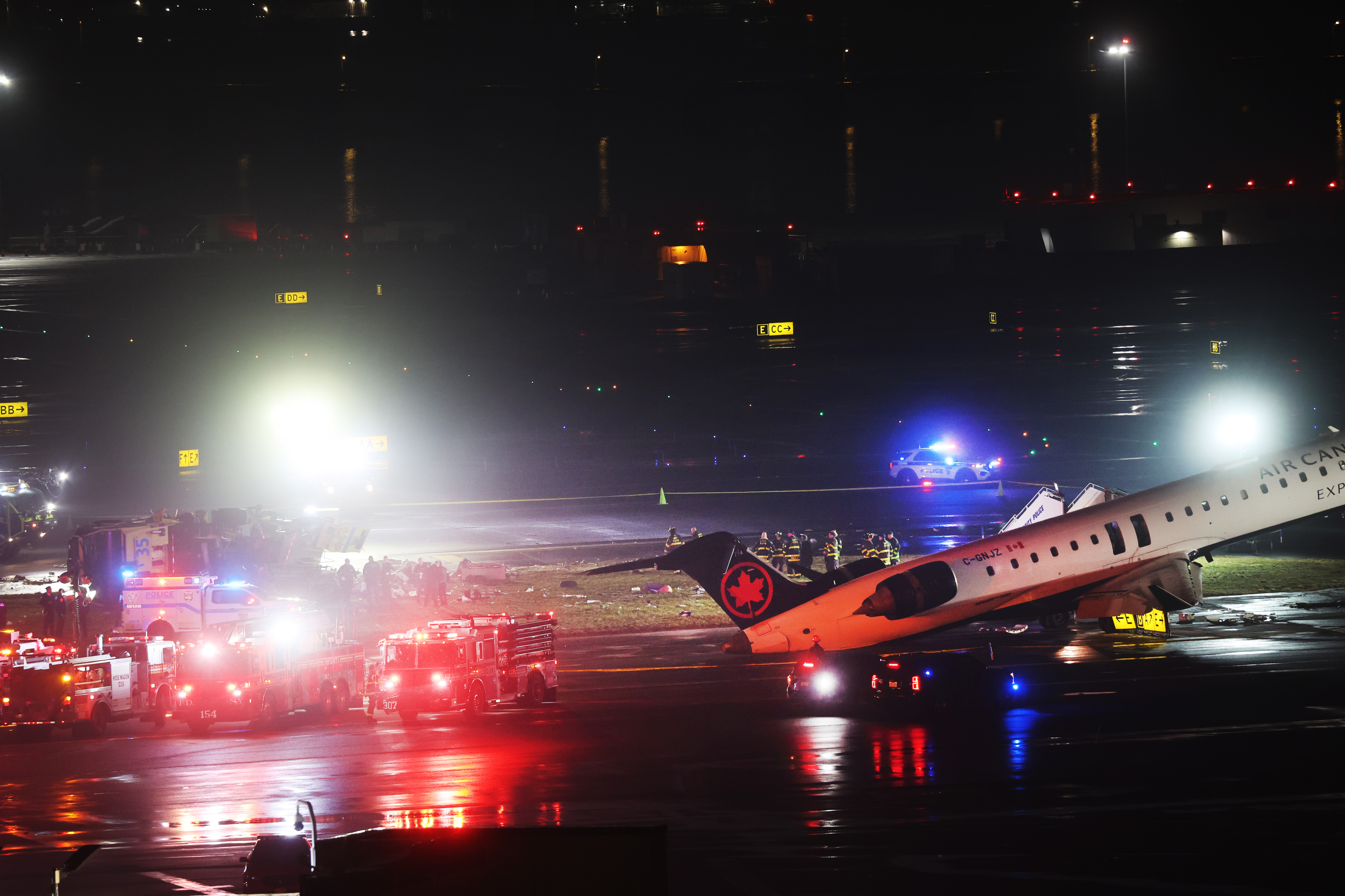 An Air Canada Express plane sits on the tarmac after it collided with a fire truck on the tarmac at LaGuardia Airport on March 23, 2026 in New York City | Source: Getty Images