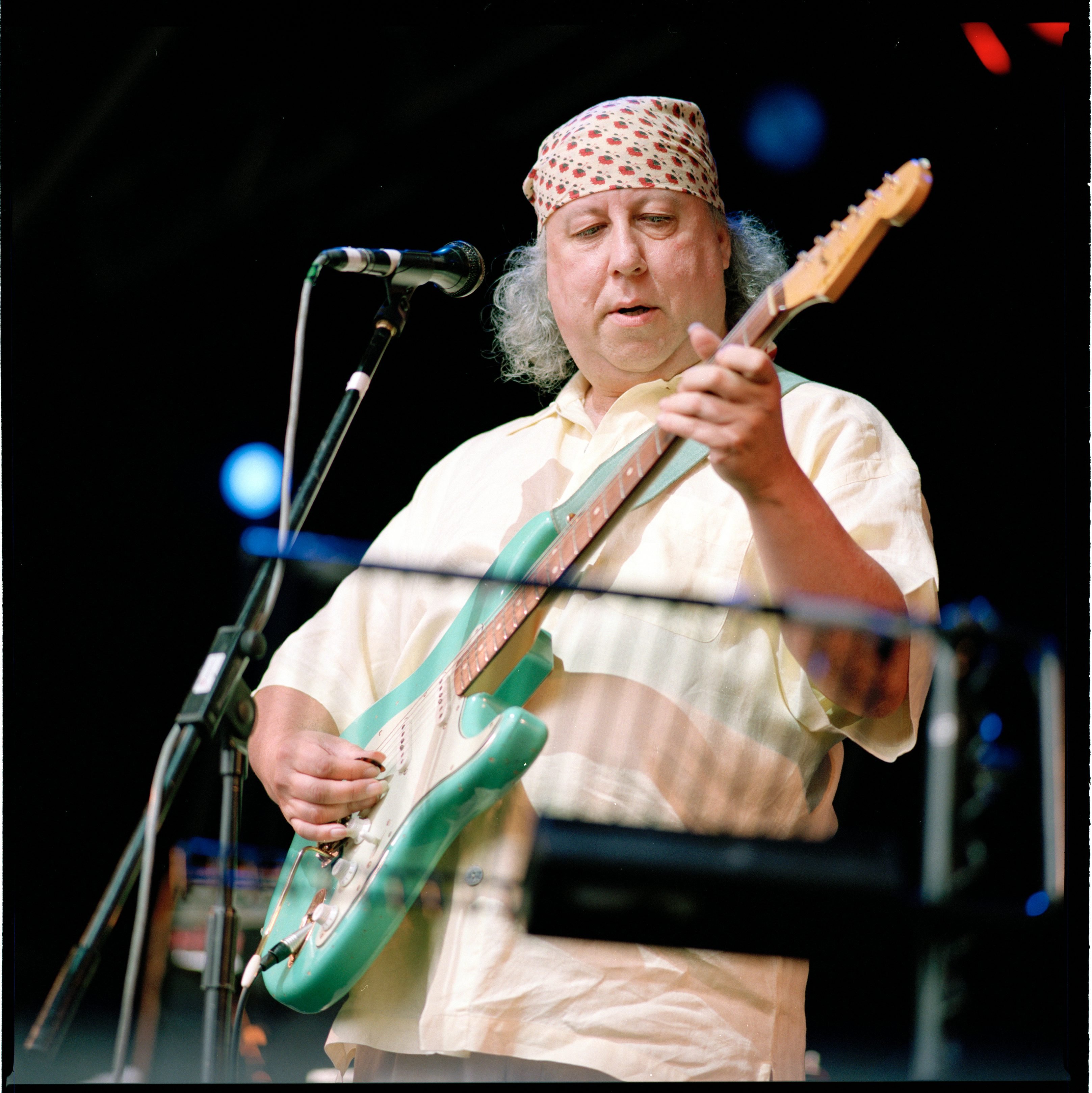 Peter Green performs on stage at Bishopstock Blues Festival, Devon, United Kingdom, August 2001. | Photo by Michael Putland/Getty Images