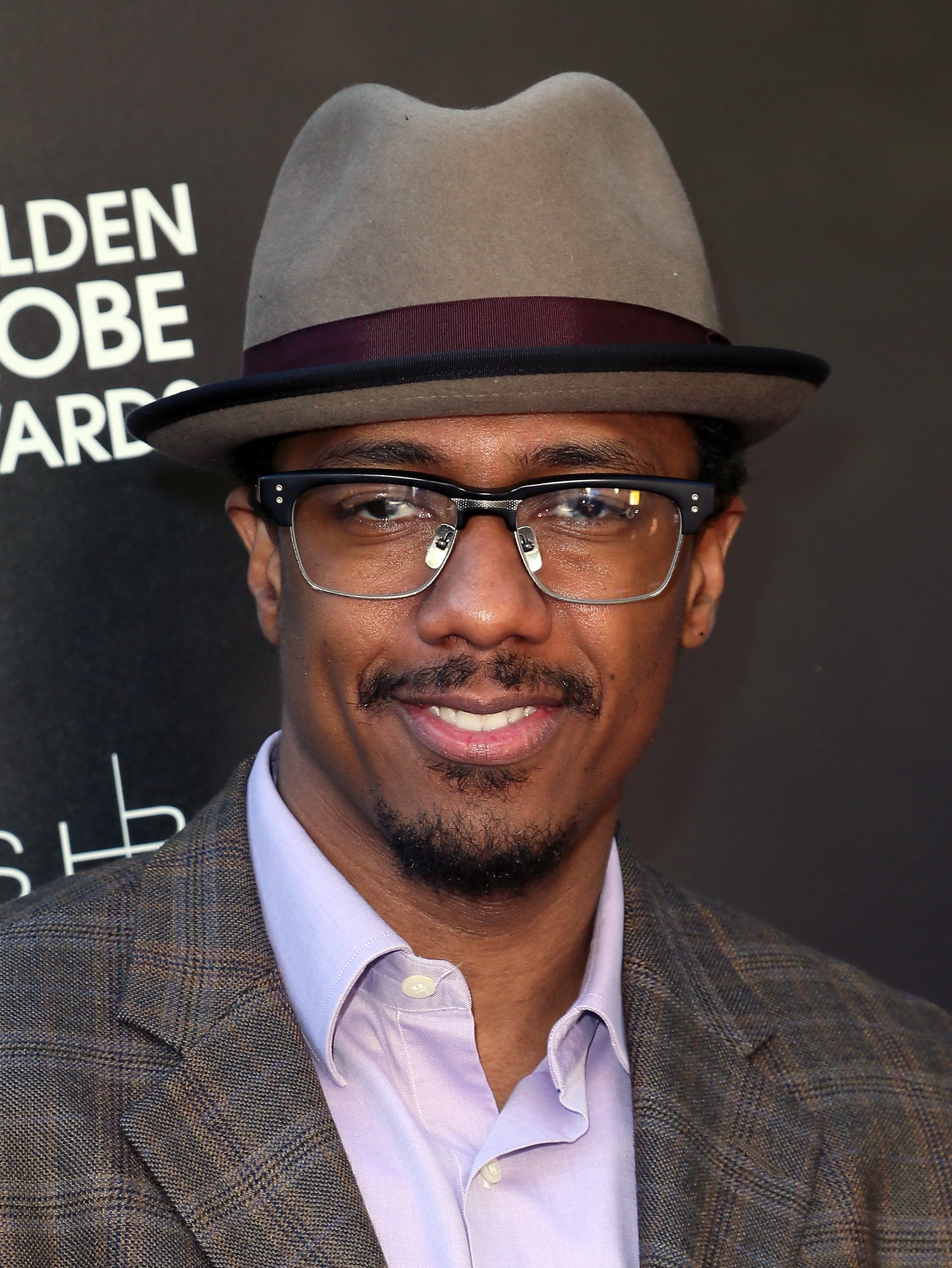 TV host Nick Cannon attends Amnesty International USA's Inaugural Art for Amnesty Pre-Golden Globes Recognition Brunch at Chateau Marmont on January 8, 2016 in Los Angeles, California | Source: Getty Images