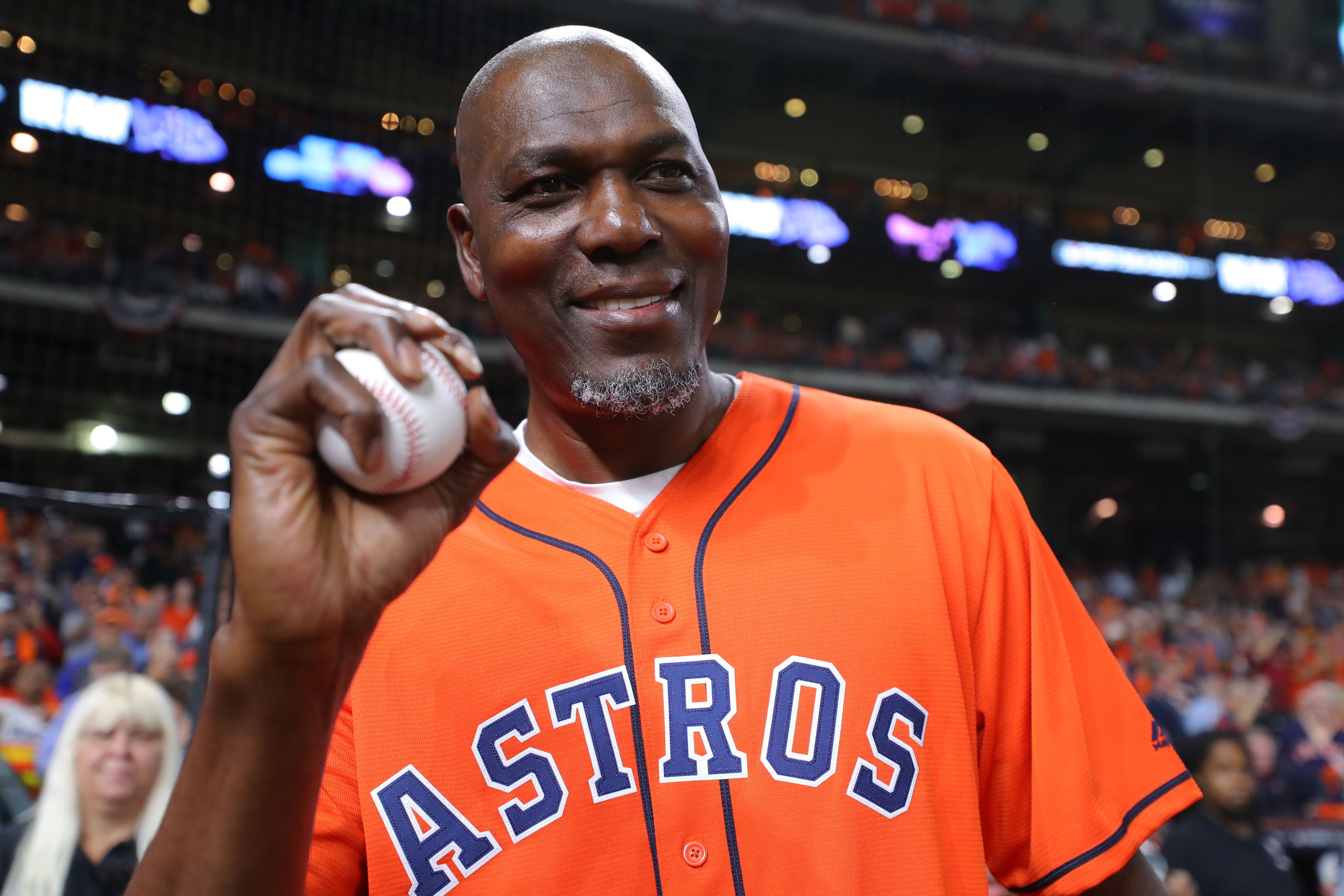 Hakeem Olajuwon holds the game ball prior to Game 6 of the 2019 World Series between the Washington Nationals and the Houston Astros at Minute Maid Park on Tuesday, October 29, 2019 in Houston, Texas. | Source: Getty Images