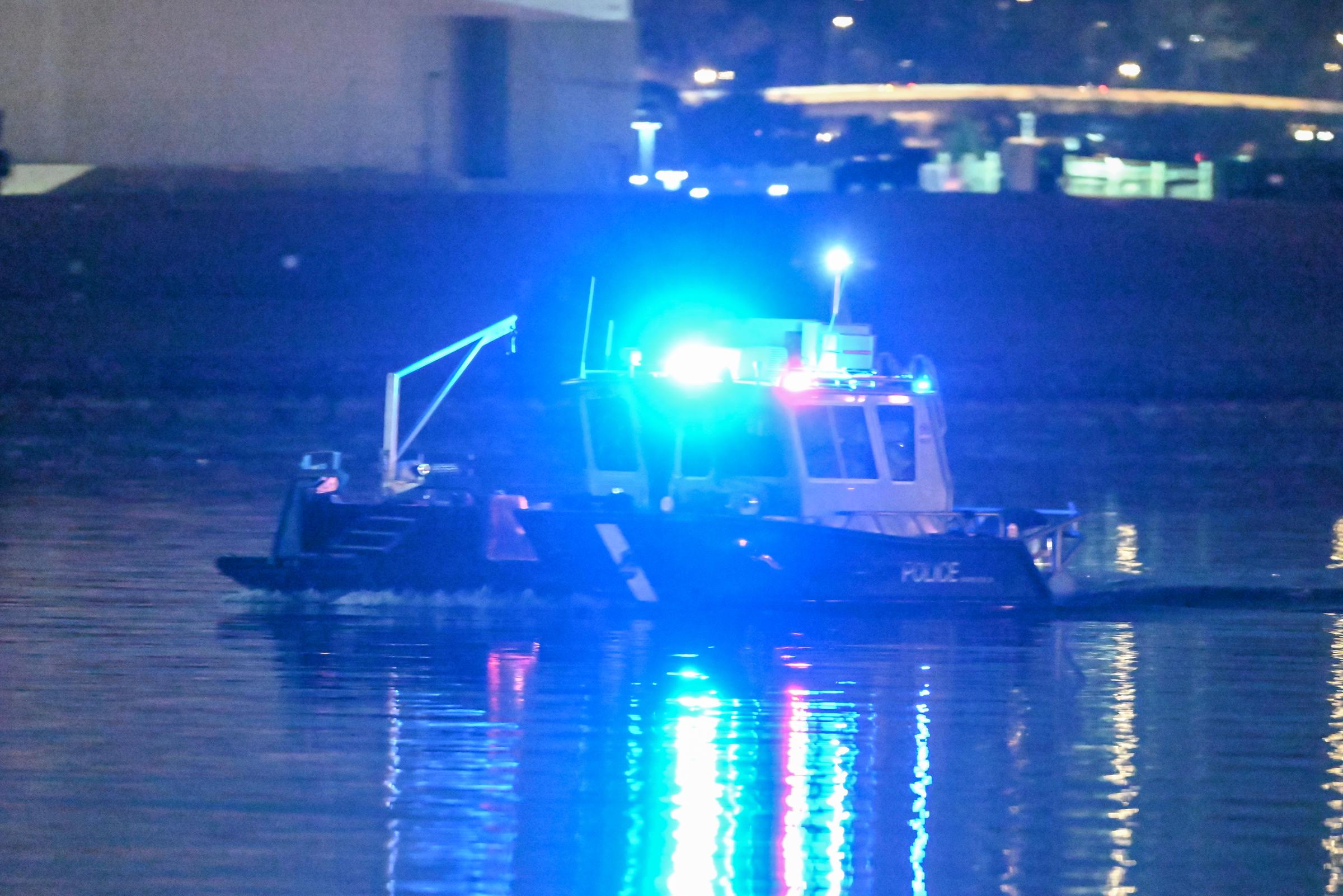 A police boat patrolling the Potomac River after the plane crash in Washington, D.C., on January 30, 2025. | Source: Getty Images