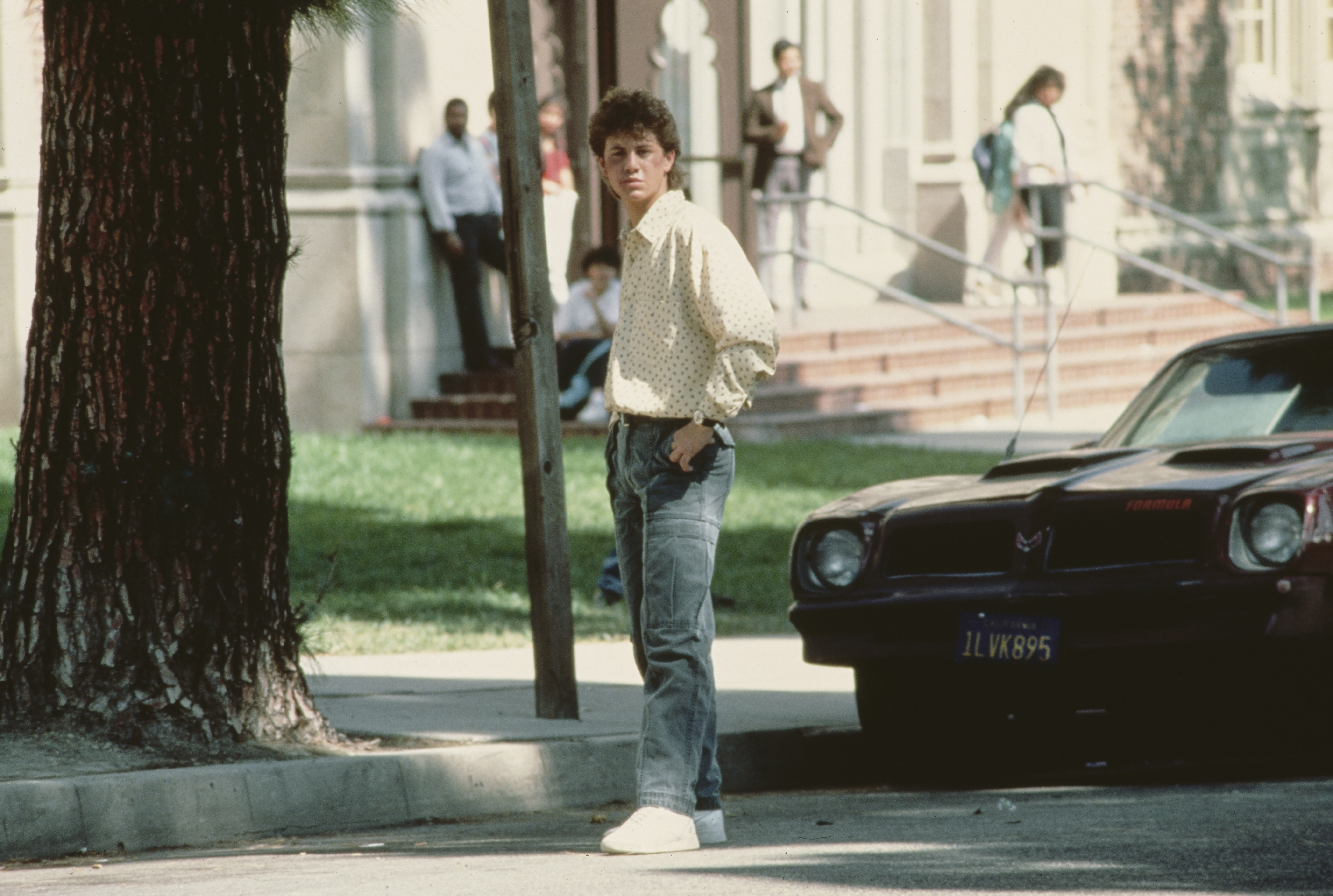 The actor poses for a photo, circa 1987 | Source: Getty Images