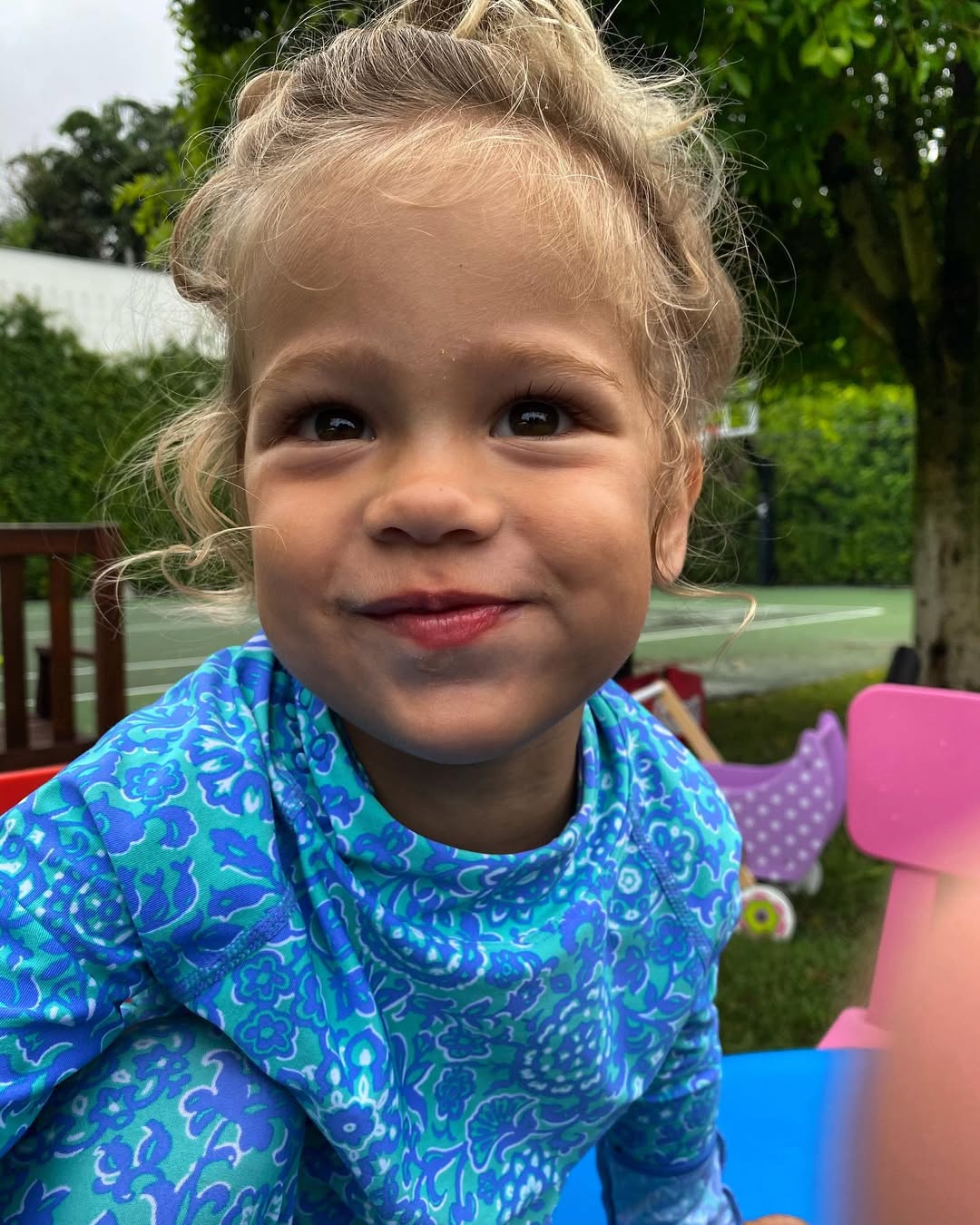 Lucy Iglesias smiling for the camera, from a post celebrating her third birthday dated December 16, 2020 | Source: Instagram/annakournikova