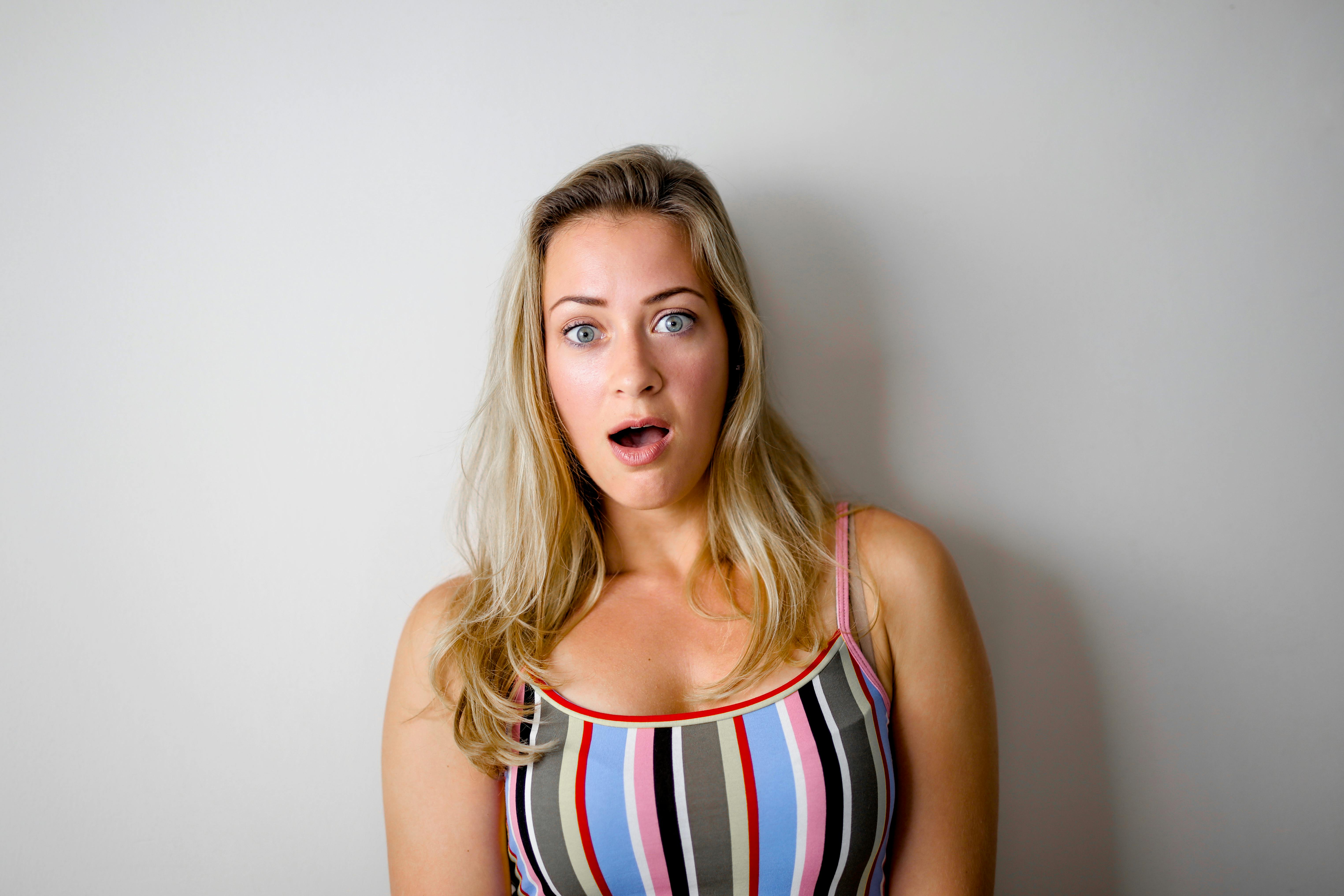 A woman reacting in shock | Source: Pexels