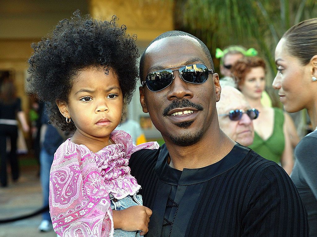 Eddie Murphy and his daughter during the Los Angeles premiere of "Shrek 2" at the Mann Village Theatre May 8, 2004 in Westwood, California. | Source: Getty Images
