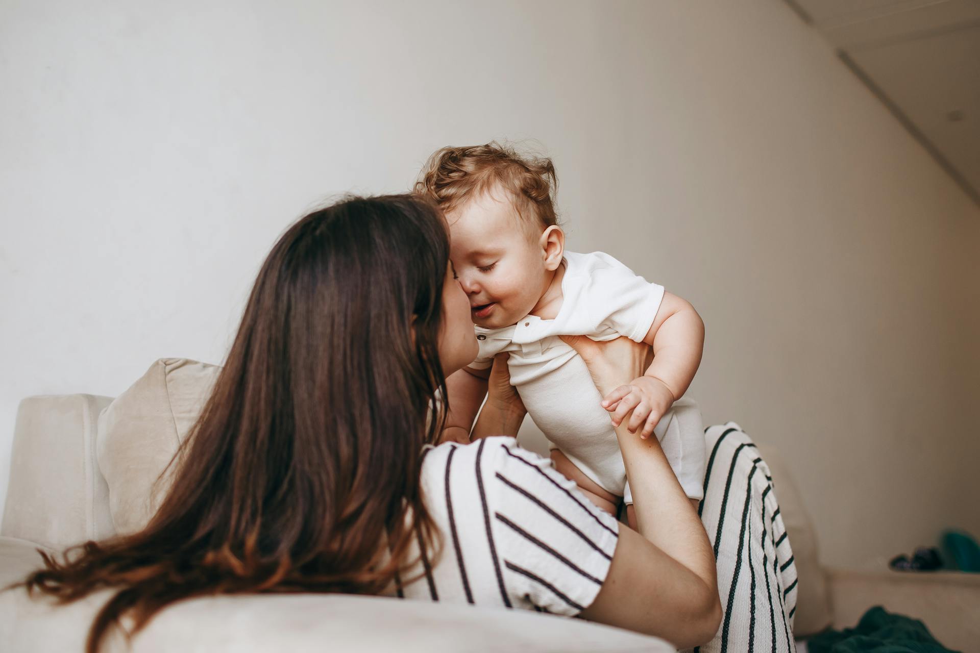 A woman playing with her baby | Source: Pexels