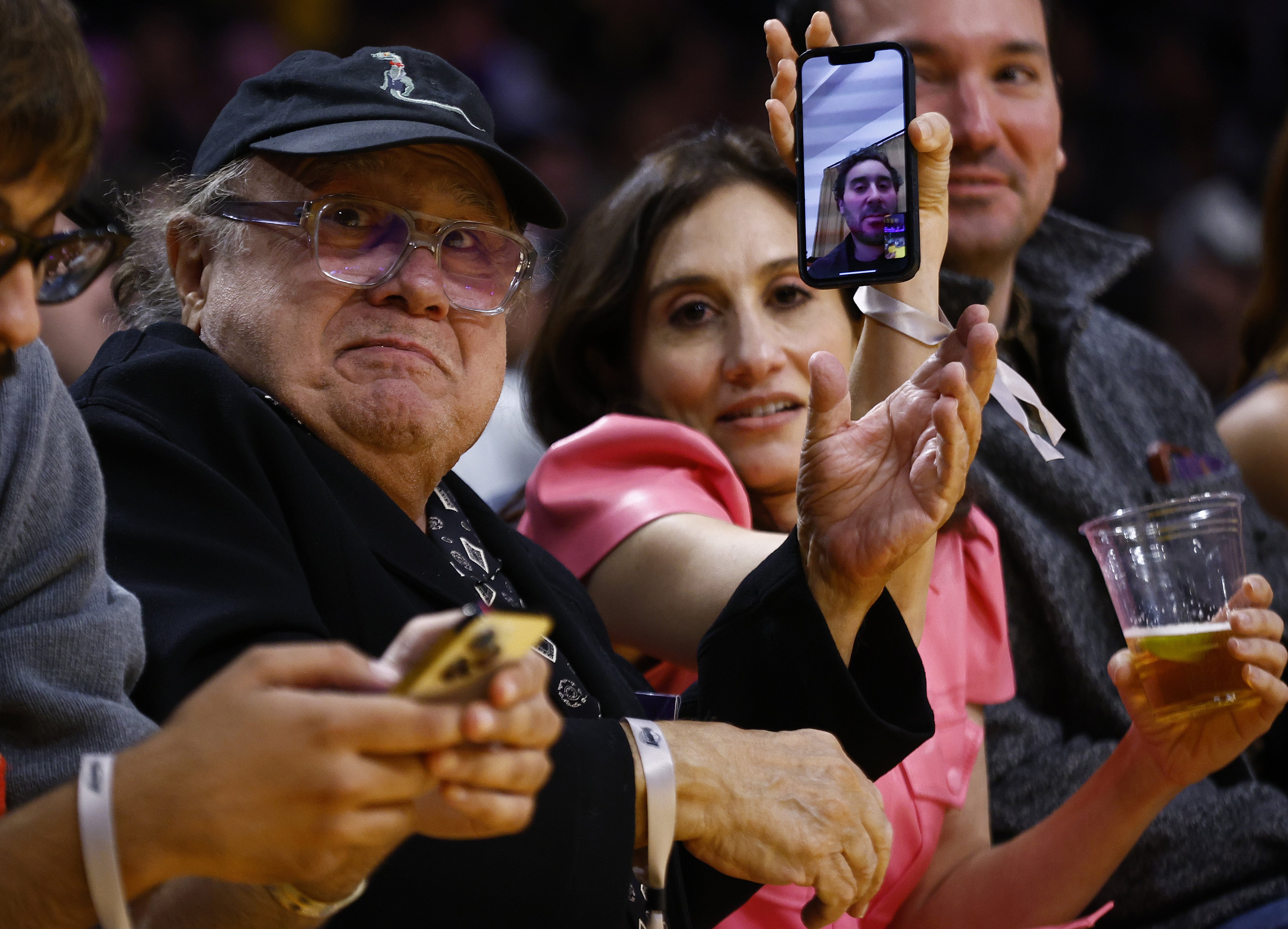 Danny DeVito video calling Jake DeVito at a basketball match between Sacramento Kings and the Los Angeles Lakers at Crypto.com Arena in Los Angeles, California, on January 18, 2023. | Source: Getty Images