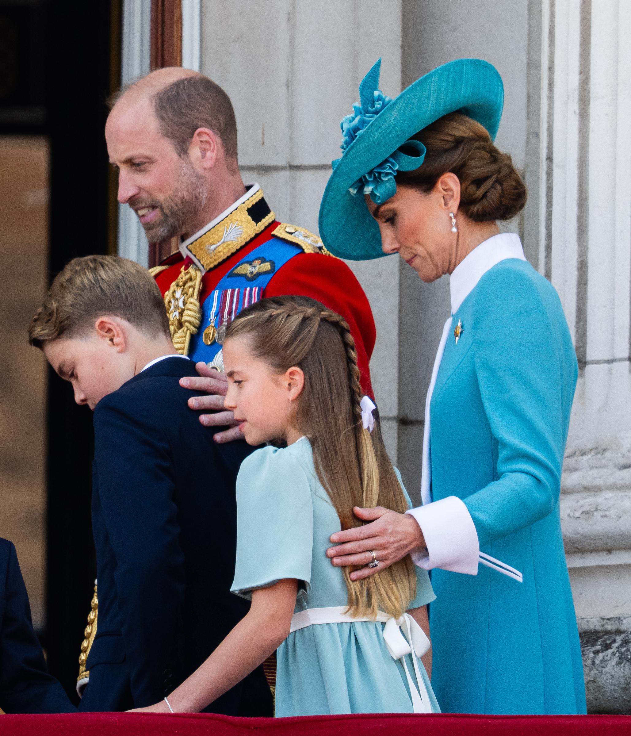 The Royal Family — Prince William, Prince George, Princess Catherine, and Princess Charlotte are photographed on the Buckingham Palace balcony.
