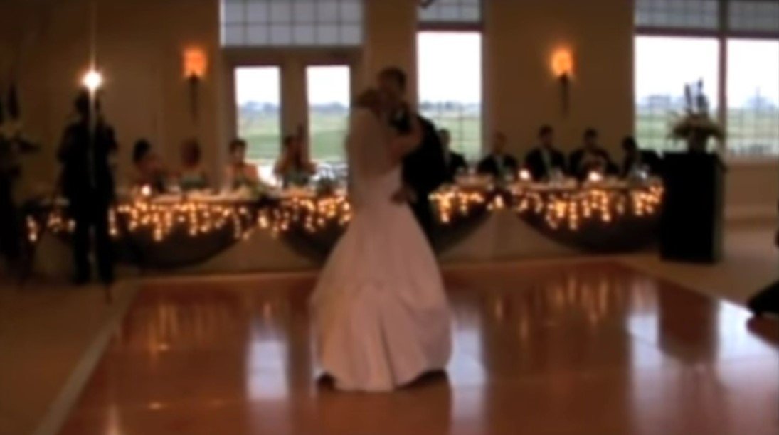 Jennifer Darmon and Mike Belawetz dancing at their wedding ceremony | Source: Youtube/ Rehab Institute 