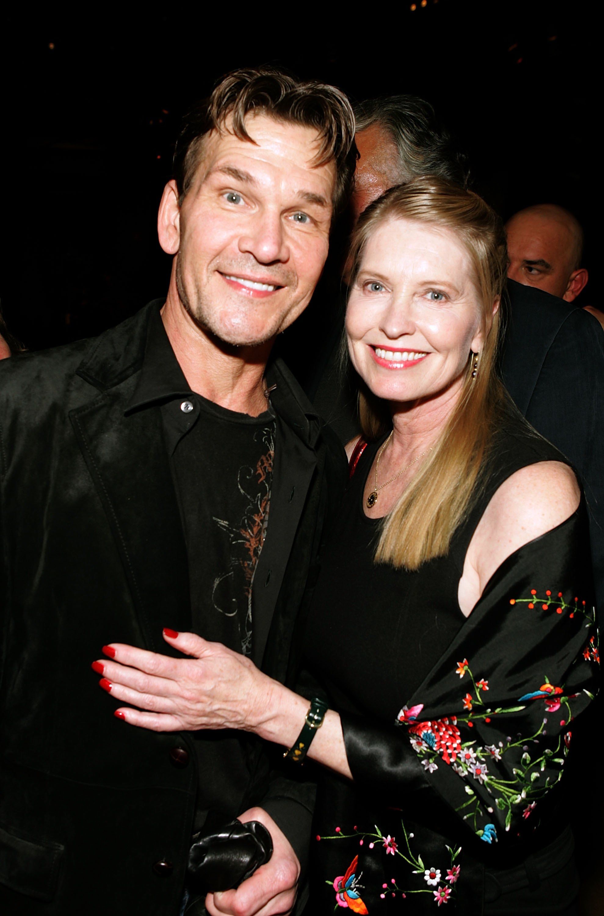 Patrick Swayze and wife Lisa Niemi pose at the premiere of "Rocky Balboa" on December 13, 2006, in Hollywood, California | Photo: Frazer Harrison/Getty Images